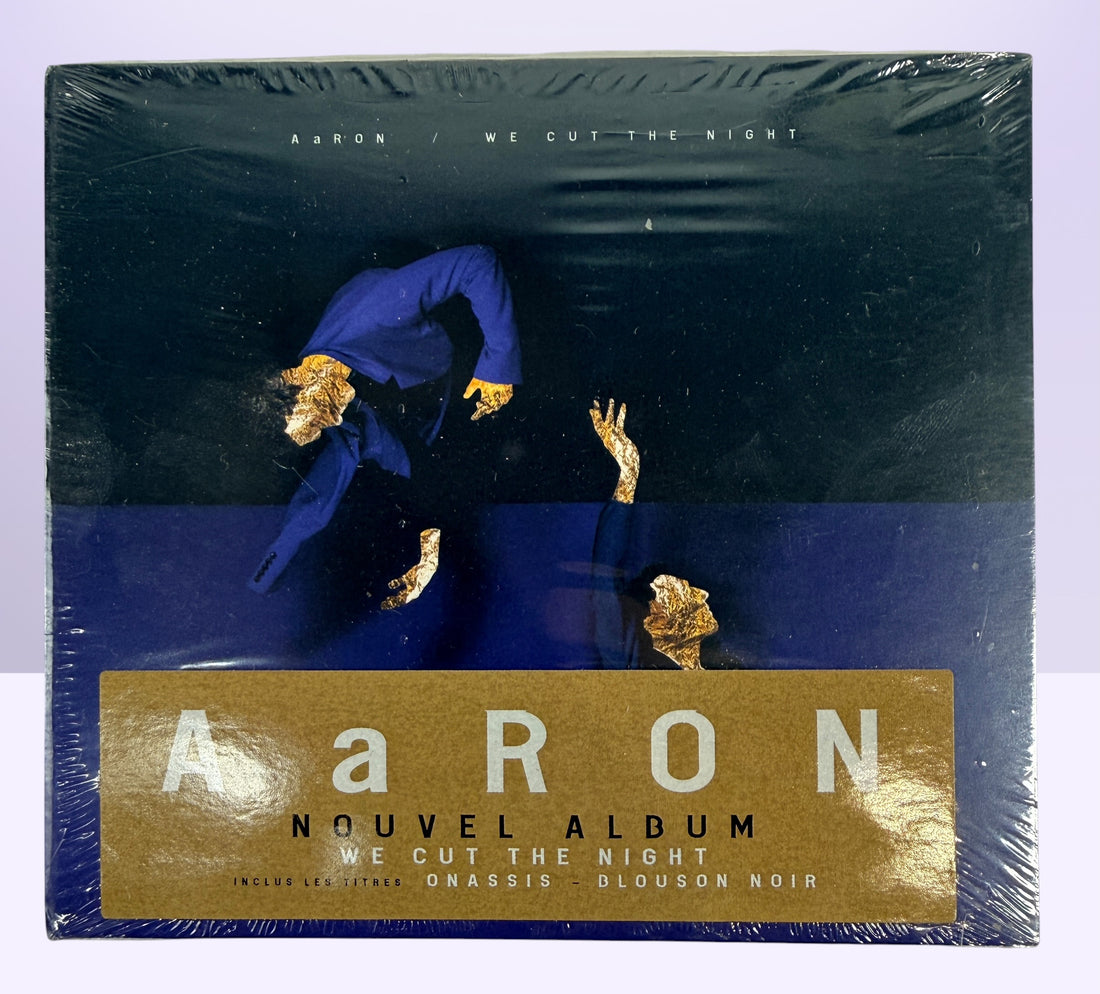 Sealed 2015 AaRON We Cut The Night deluxe French CD edition in collectible hardcover digibook packaging.