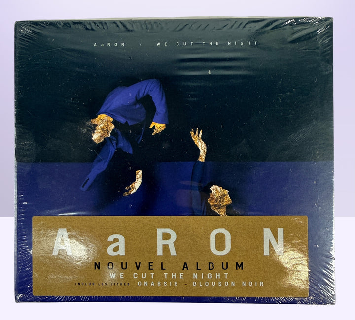 Sealed 2015 AaRON We Cut The Night deluxe French CD edition in collectible hardcover digibook packaging.