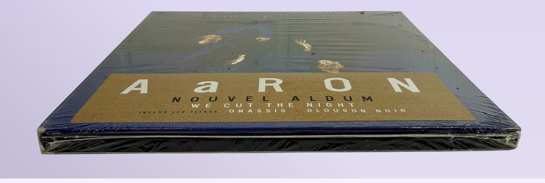 Sealed 2015 AaRON We Cut The Night deluxe French CD edition in collectible hardcover digibook packaging.