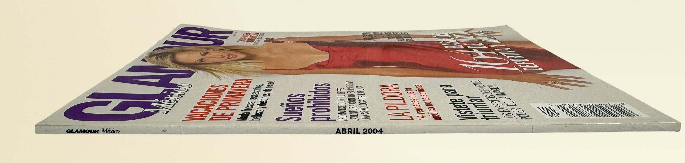 Vintage Glamour México April 2004 magazine featuring Charlize Theron cover with Y2K fashion editorials and collectible Givenchy advertising.