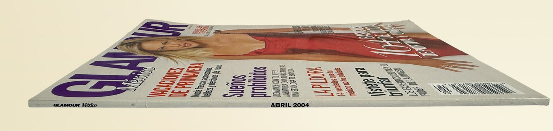 Vintage Glamour México April 2004 magazine featuring Charlize Theron cover with Y2K fashion editorials and collectible Givenchy advertising.