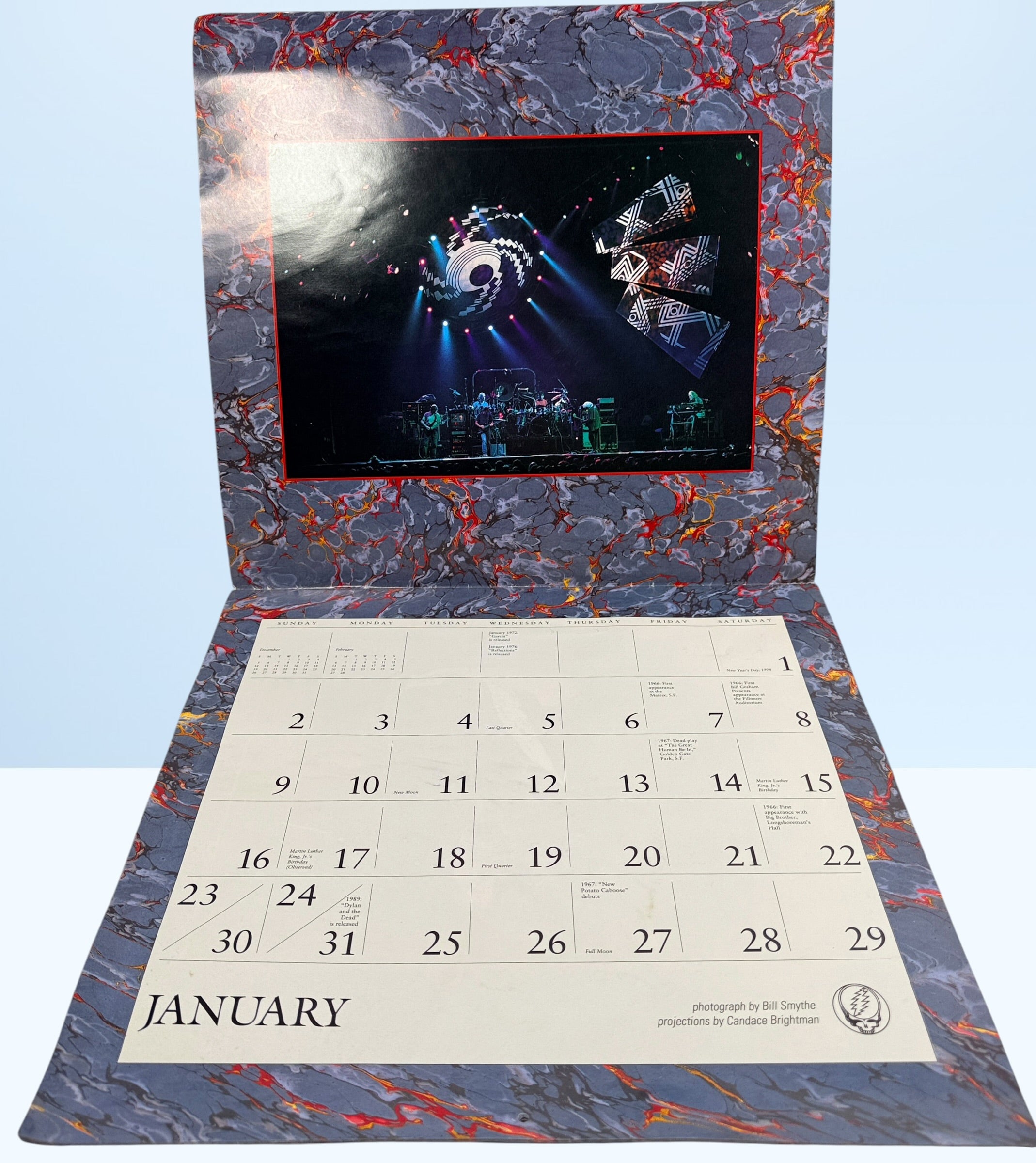 Vintage 1994 Grateful Dead wall calendar with Steal Your Face artwork and concert photography. Official licensed Deadhead collectible memorabili