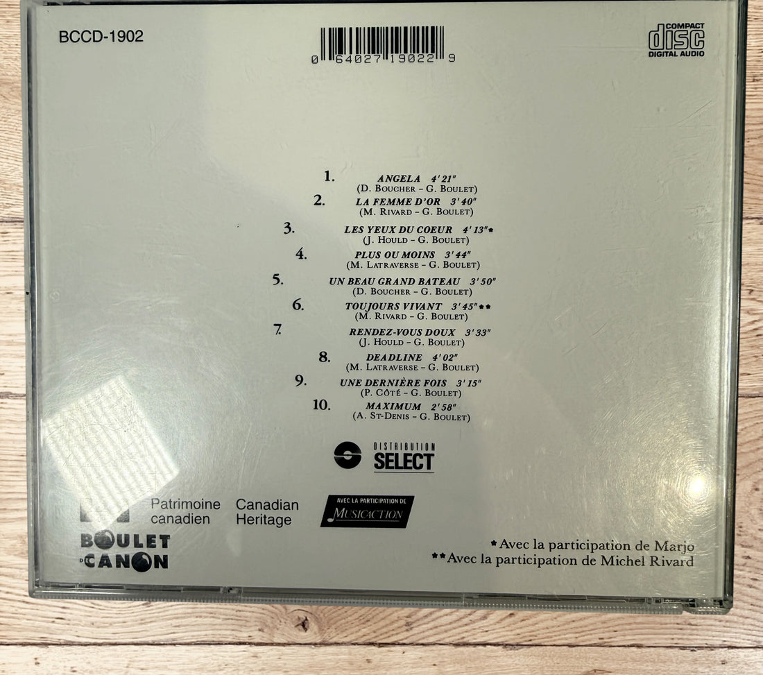 Original Gerry Boulet Rendez-vous doux Canadian CD, classic Quebec francophone rock album with complete inserts and case.