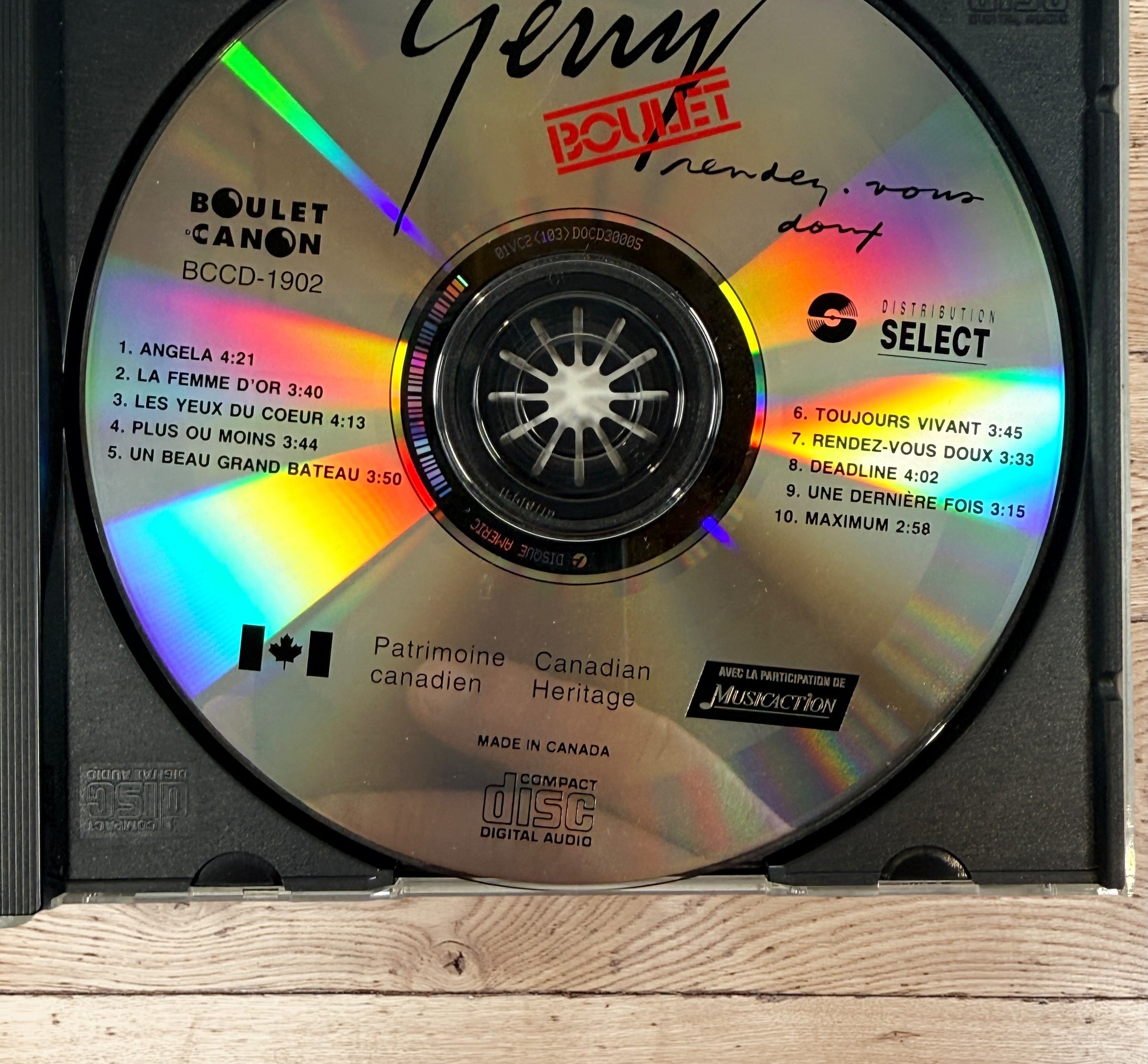 Original Gerry Boulet Rendez-vous doux Canadian CD, classic Quebec francophone rock album with complete inserts and case.
