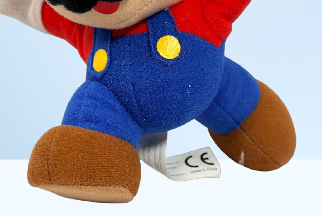Official 2008 Nintendo Mario plush toy by Corgi Classics in running pose. Great collectible for Super Mario and retro gaming fans.