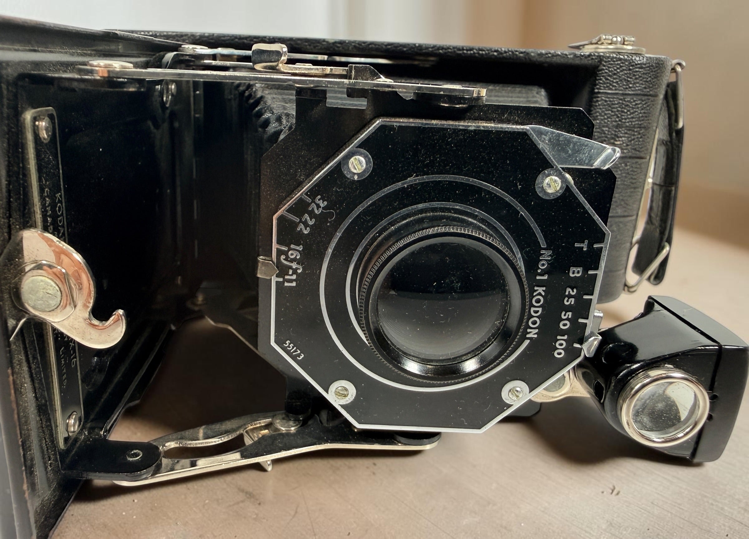 Vintage Kodak Junior Six-16 folding camera made in Canada with working shutter and intact bellows. Classic Art Deco Kodak collectible camera.