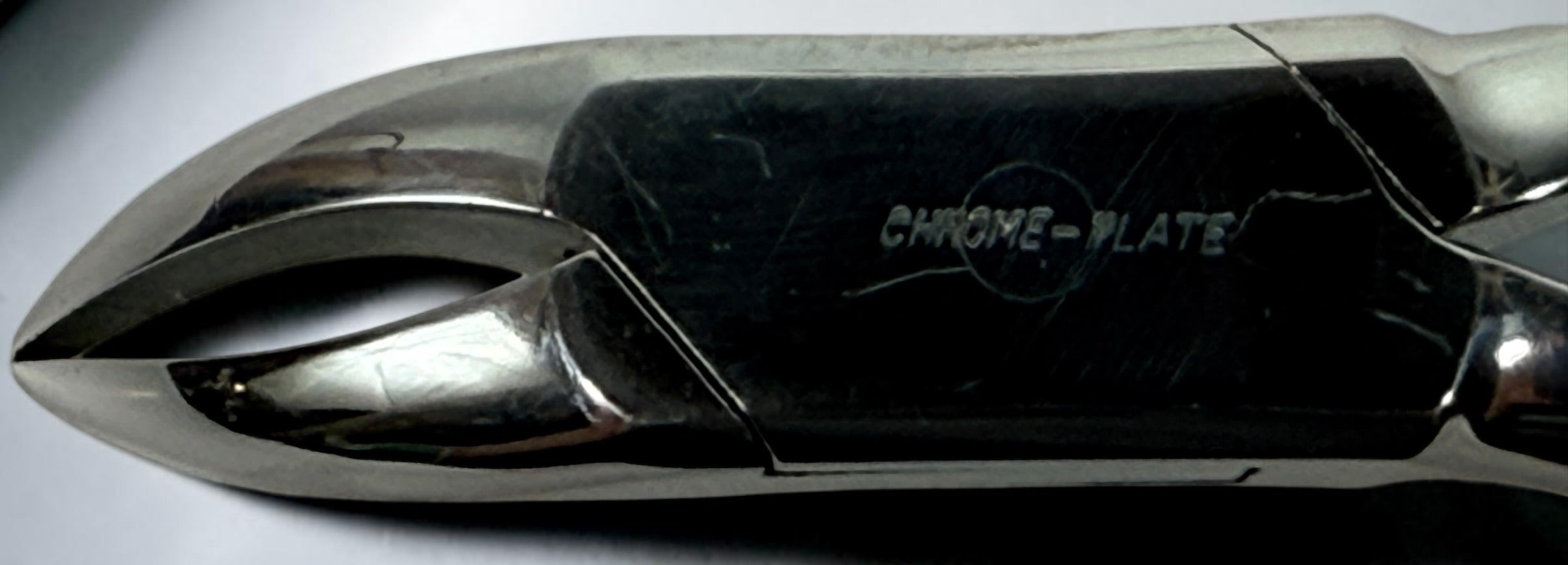 Vintage KNY Scherrer German dental extraction forceps No. 72. Chrome-plated oral surgery instrument collectible in very good vintage condition.