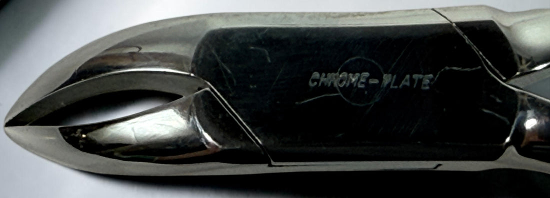Vintage KNY Scherrer German dental extraction forceps No. 72. Chrome-plated oral surgery instrument collectible in very good vintage condition.