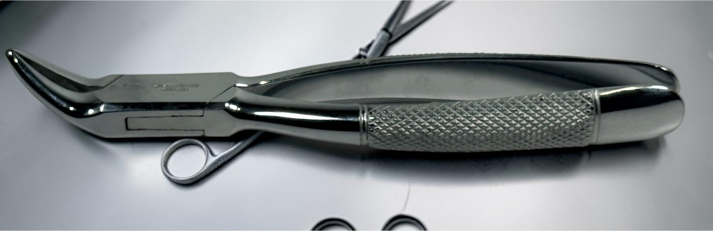Vintage KNY Scherrer German dental extraction forceps No. 72. Chrome-plated oral surgery instrument collectible in very good vintage condition.