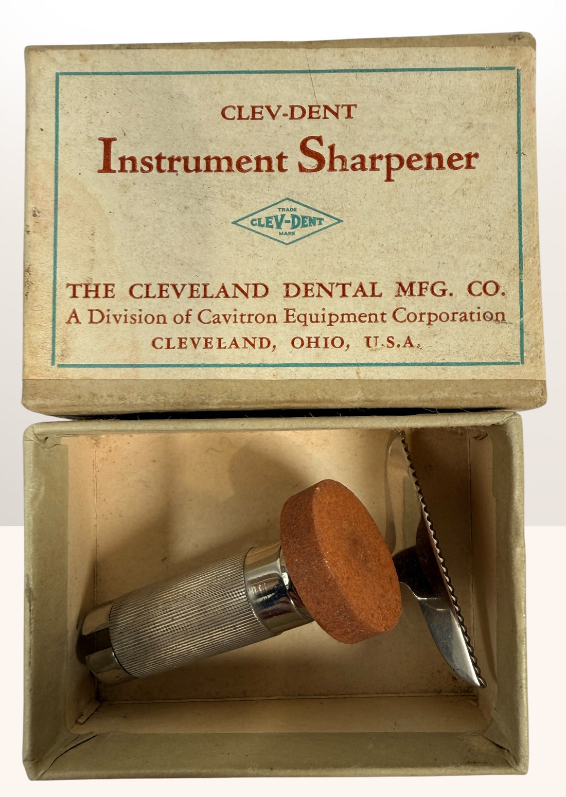 Vintage Clev-Dent dental instrument sharpener with original box, mid-century USA dental collectible and medical antique display piece.