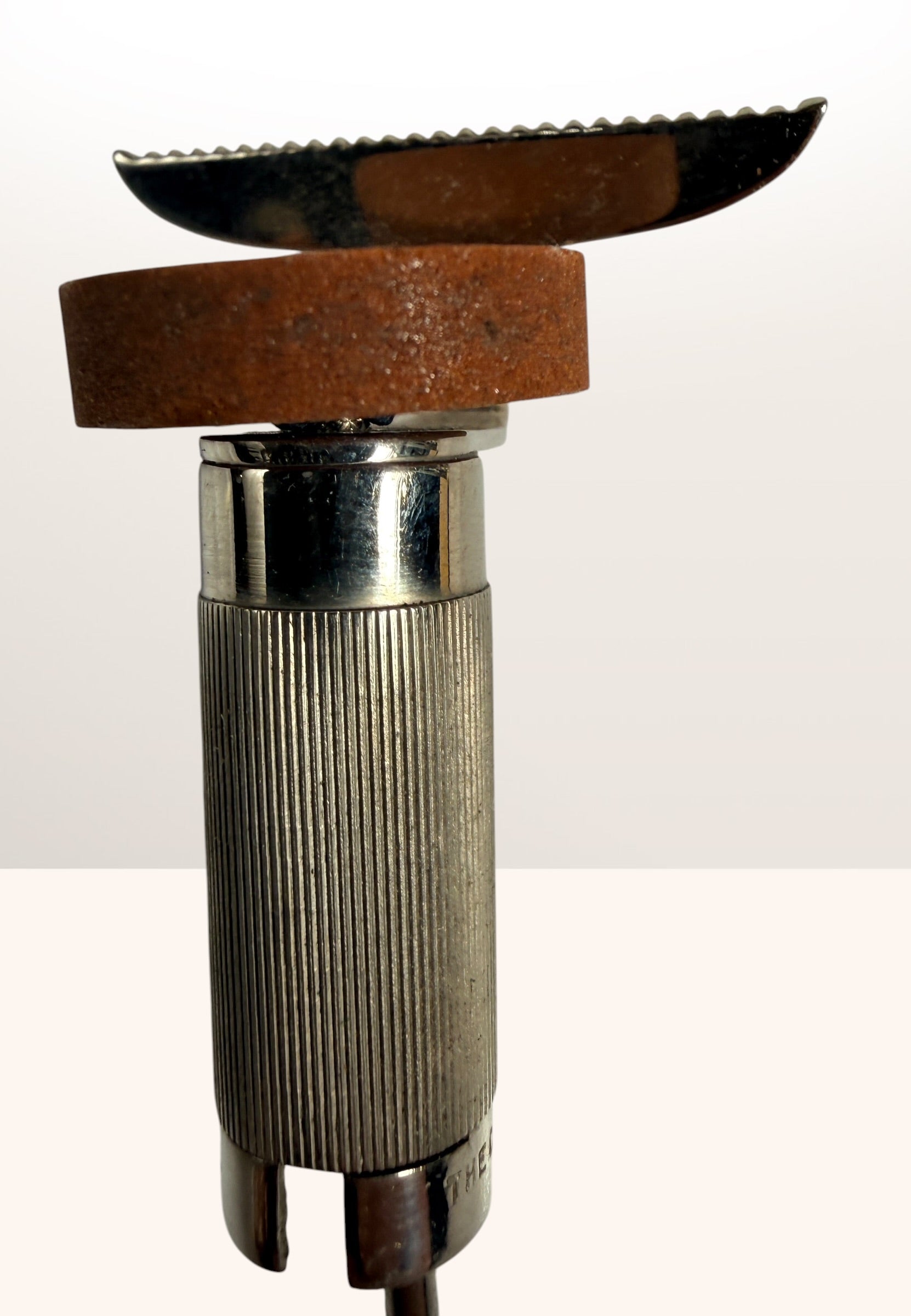 Vintage Clev-Dent dental instrument sharpener with original box, mid-century USA dental collectible and medical antique display piece.