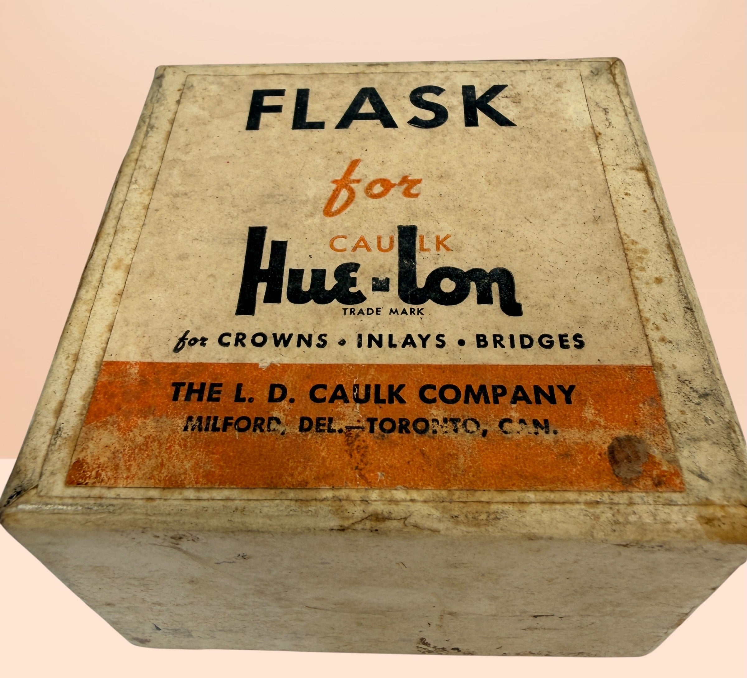 Vintage Caulk Hue-Lon dental casting flask brass mold with original box, collectible dental lab tool for crowns, bridges, and medical antique displays.