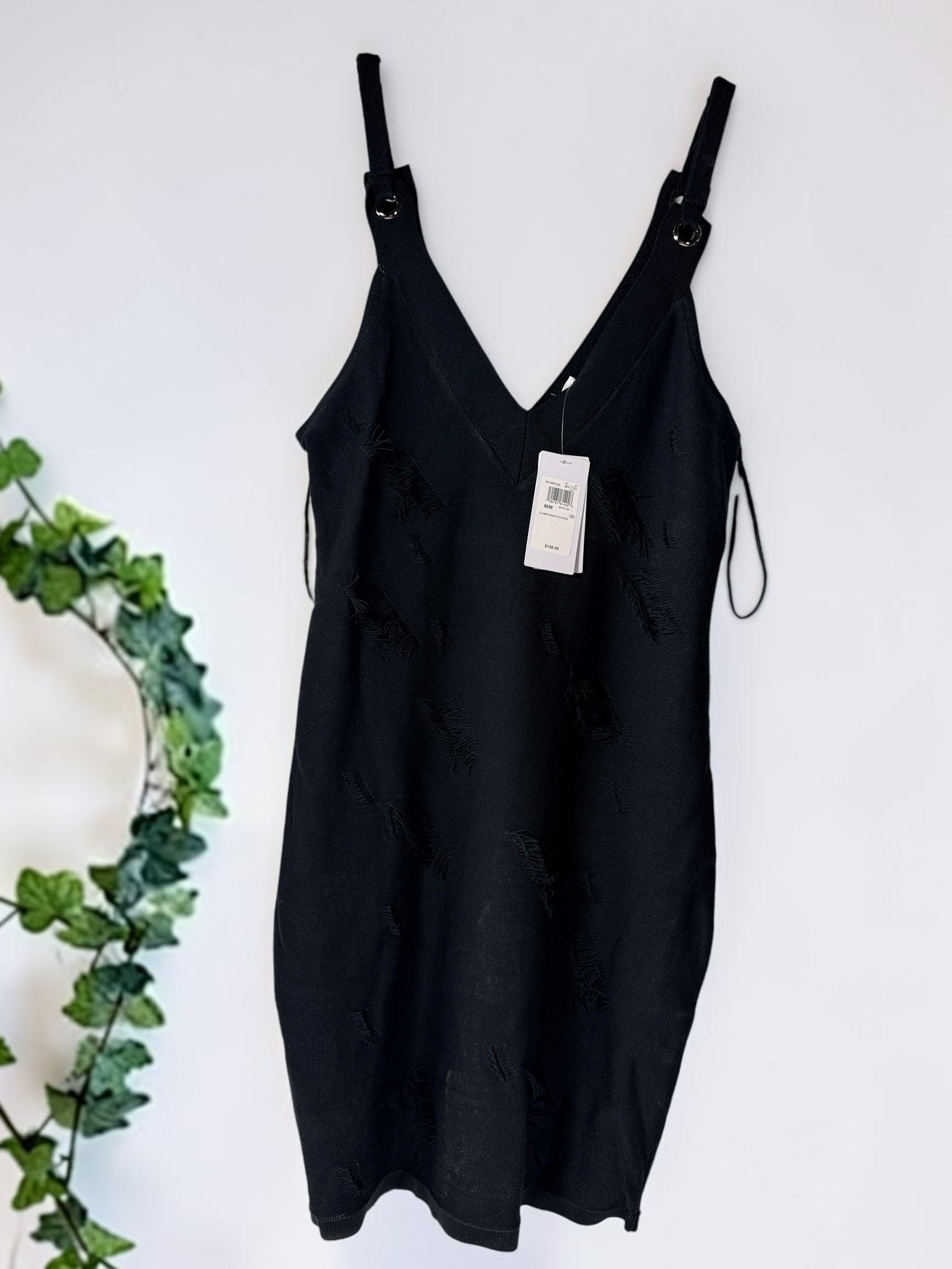GUESS black fringe stitch bodycon dress size medium with hardware straps, new with tags contemporary edgy fashion style.