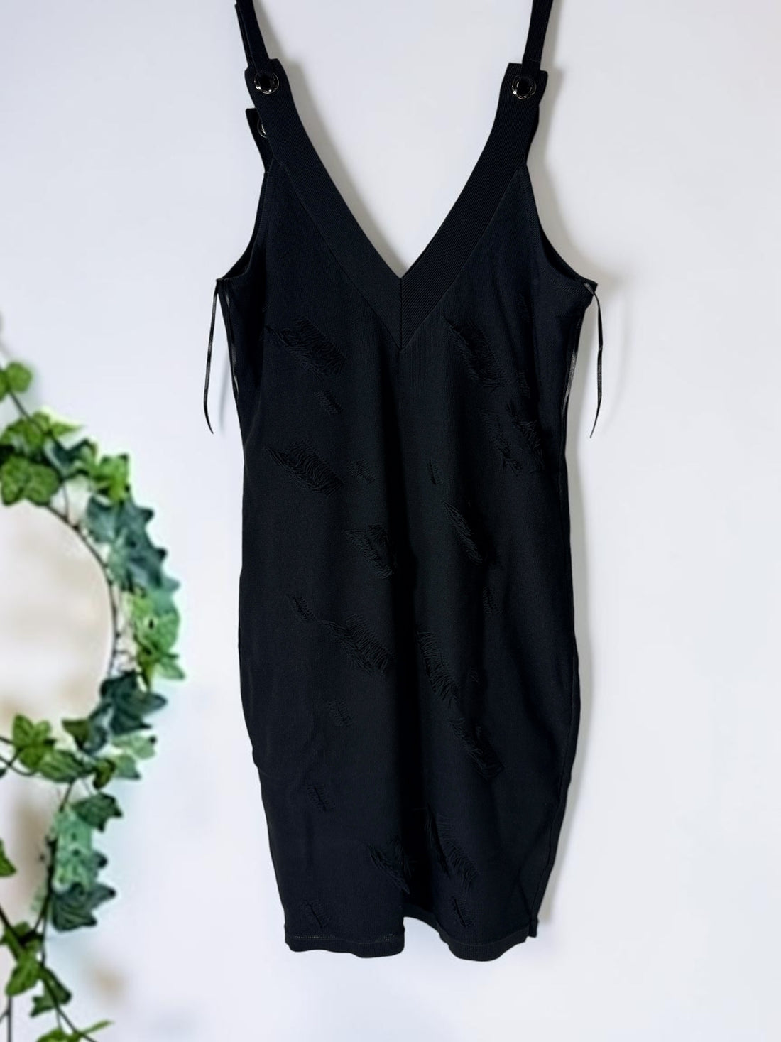 GUESS black fringe stitch bodycon dress size medium with hardware straps, new with tags contemporary edgy fashion style.