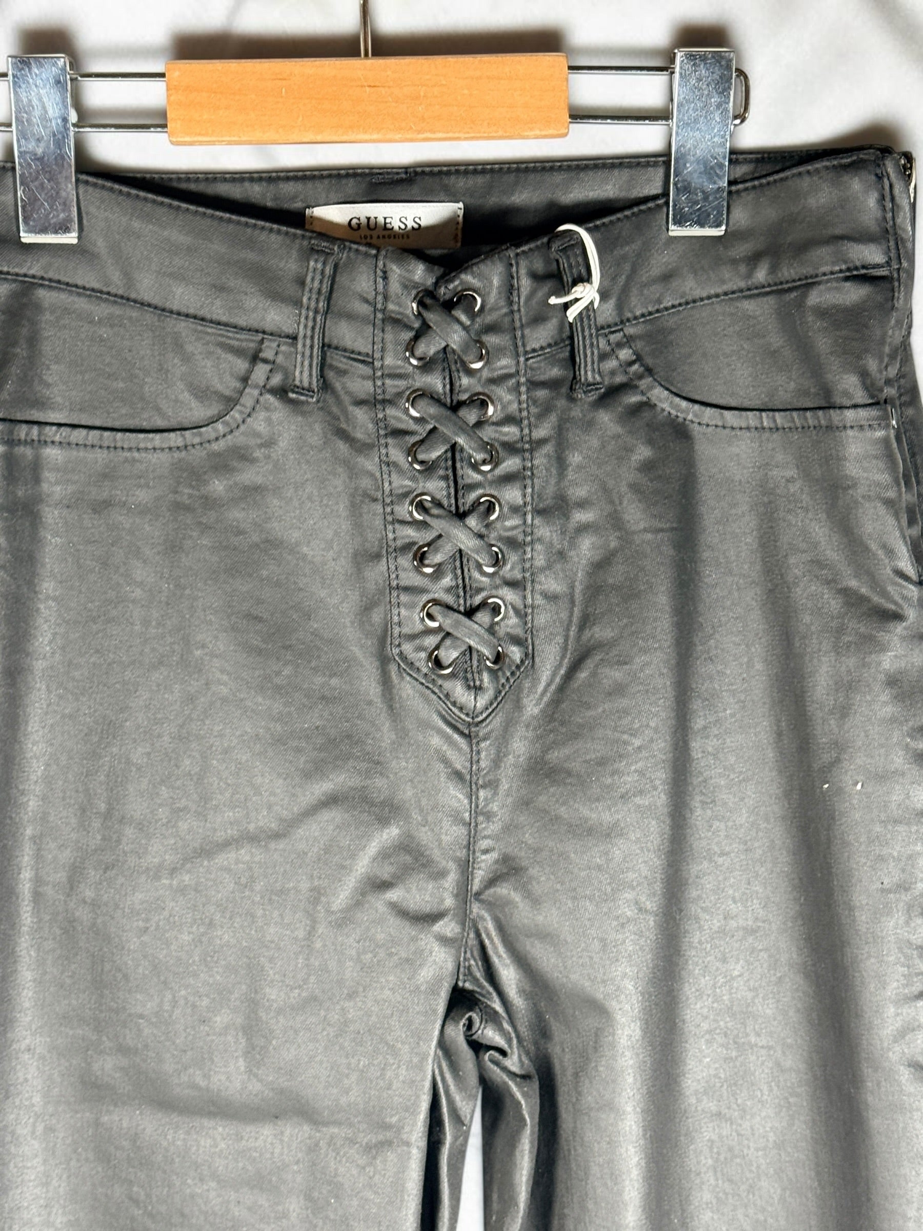GUESS lace-up coated skinny pants in black Noir Gemstone Wash, size 29. Faux leather look with stretch comfort, original tags attached, and stylish contemporary fit.