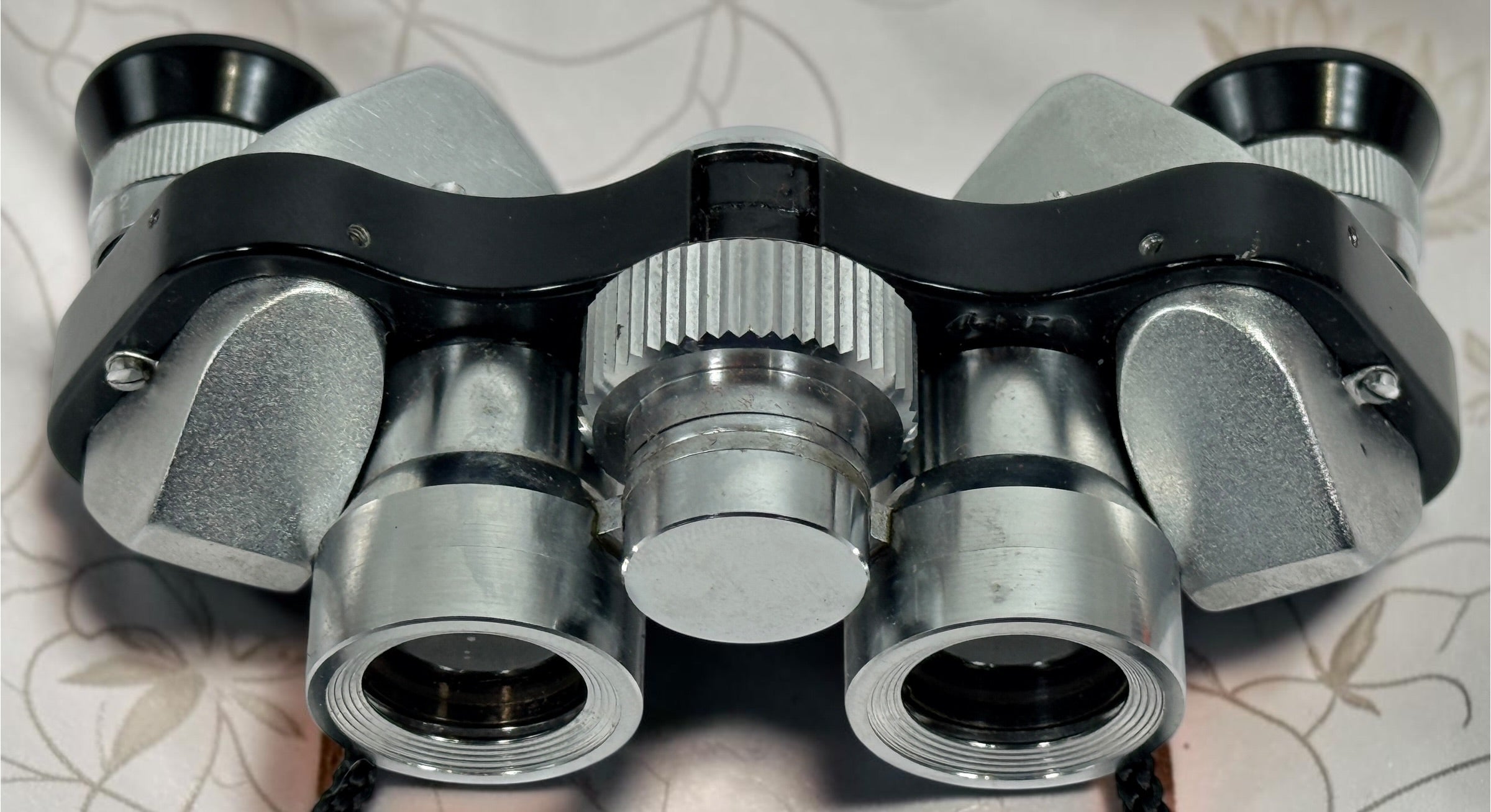 Vintage Telesar 6x15 pocket binoculars with original carrying case. Compact Japanese field glasses with coated lenses and classic mid-century styling.