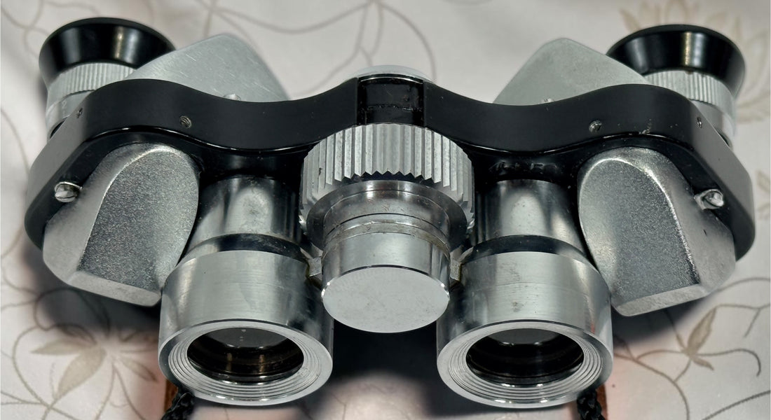 Vintage Telesar 6x15 pocket binoculars with original carrying case. Compact Japanese field glasses with coated lenses and classic mid-century styling.