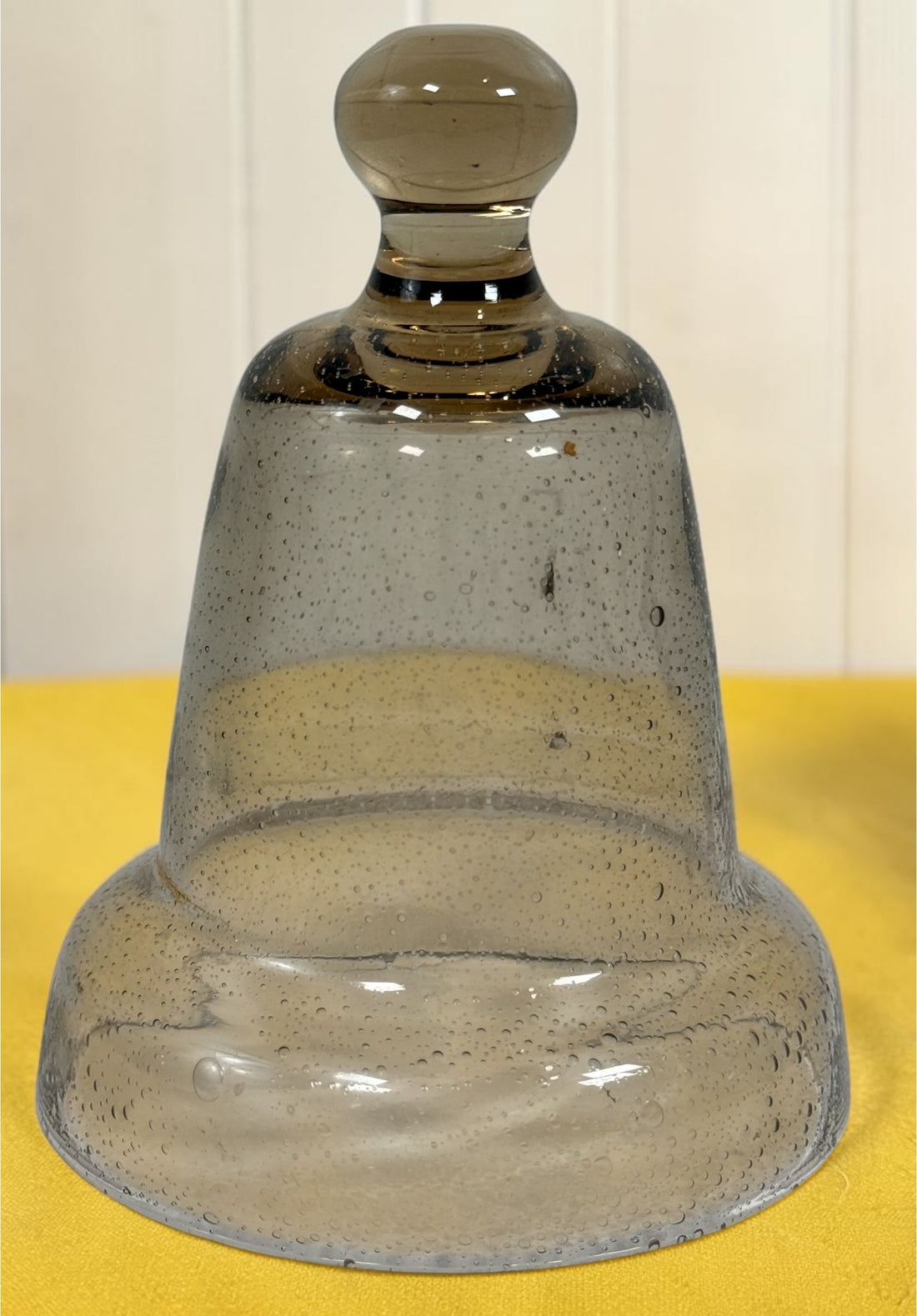 Vintage pair of mercury glass garden cloches with bell jar design and clear finials. Decorative plant covers ideal for garden or home display.