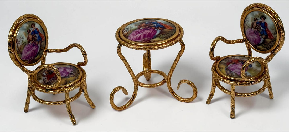 Vintage Limoges France miniature porcelain salon set with gilt metal chairs and table. Elegant French collectible featuring hand-painted romantic scenes.