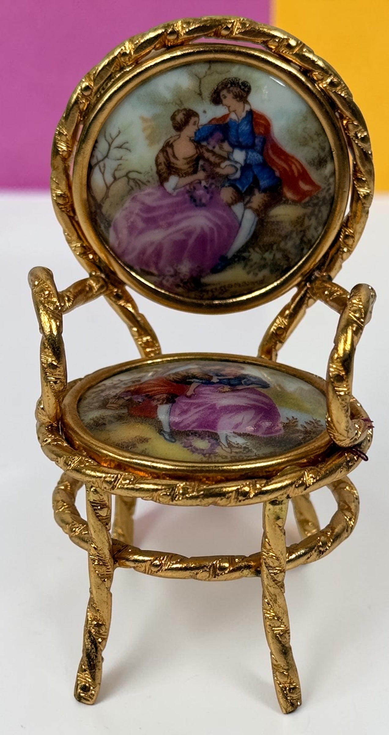 Vintage Limoges France miniature porcelain salon set with gilt metal chairs and table. Elegant French collectible featuring hand-painted romantic scenes.
