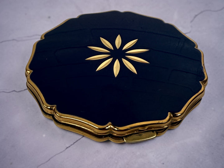 Vintage Stratton blue enamel powder compact made in England. Elegant gold-tone vanity accessory from the 1960s–1970s with mirror and original styling.