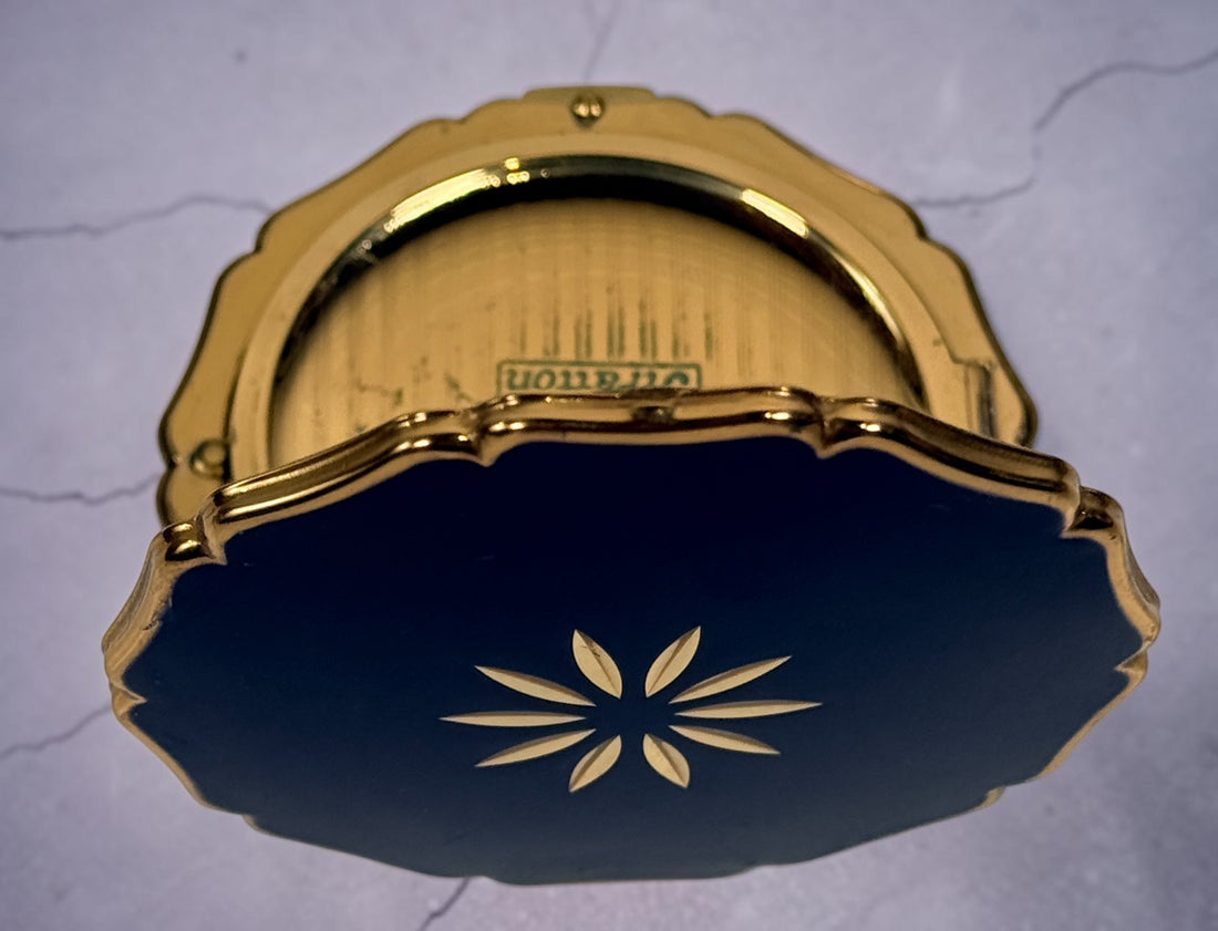Vintage Stratton blue enamel powder compact made in England. Elegant gold-tone vanity accessory from the 1960s–1970s with mirror and original styling.