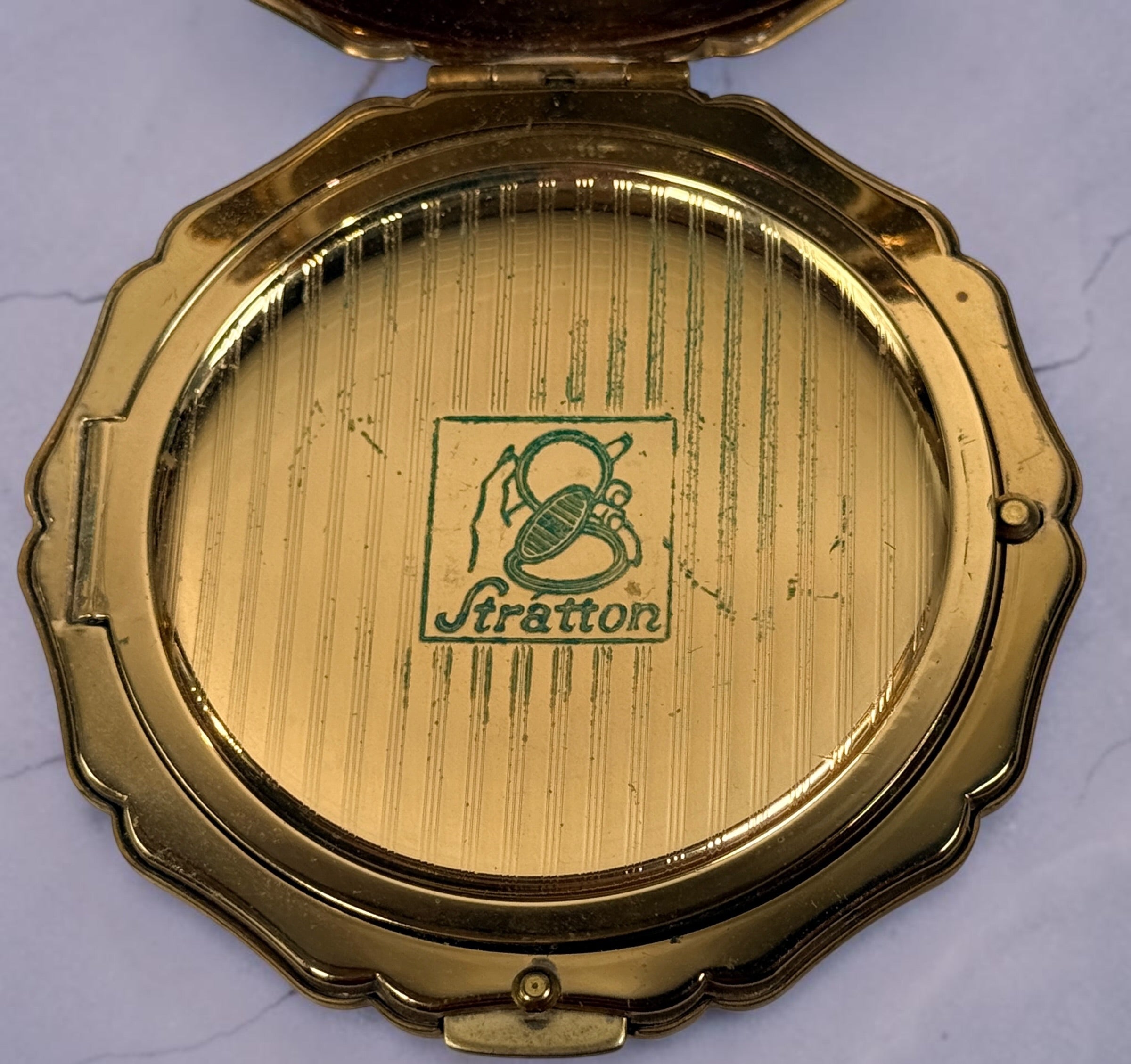 Vintage Stratton blue enamel powder compact made in England. Elegant gold-tone vanity accessory from the 1960s–1970s with mirror and original styling.