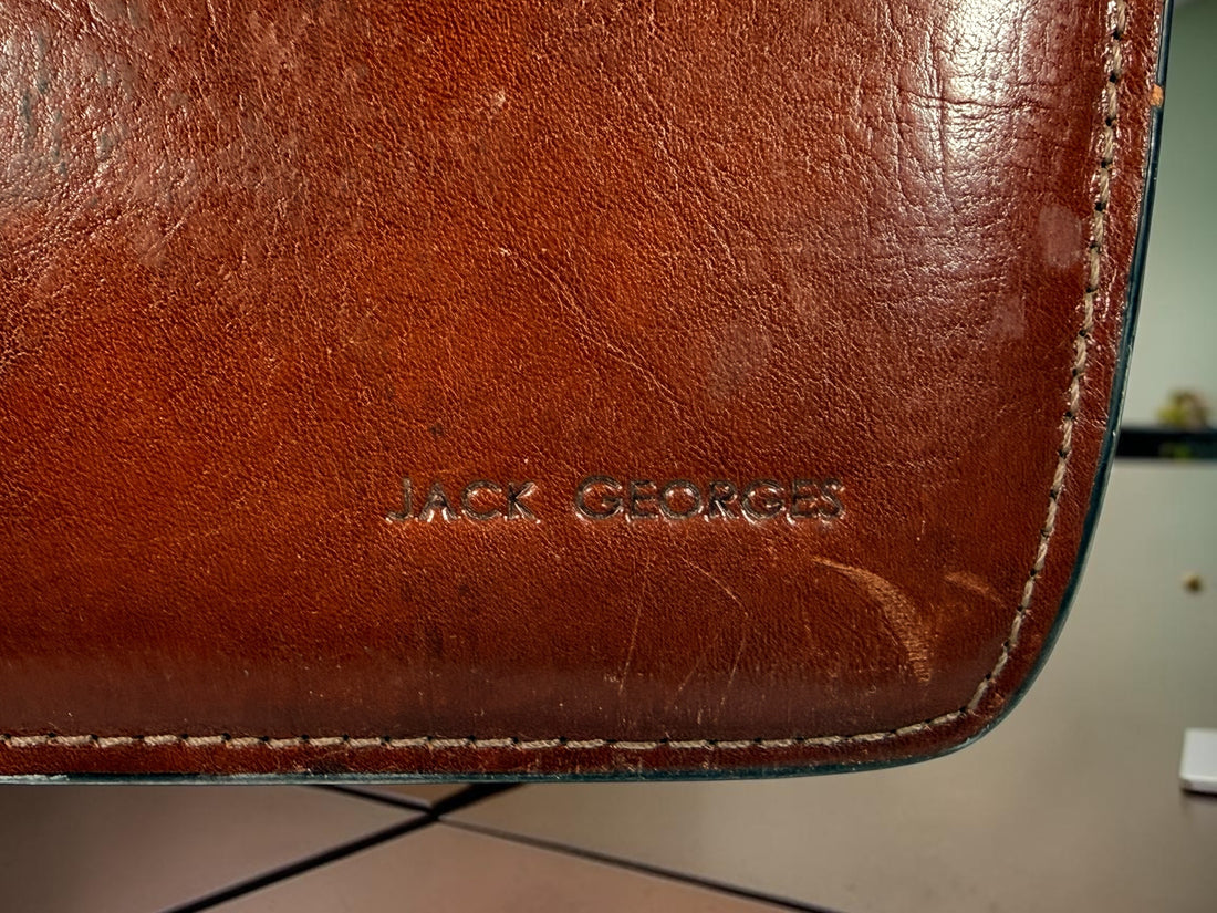 Authentic Jack Georges triple gusset leather briefcase in cognac brown featuring full-grain leather, locking closure, and spacious executive organization.