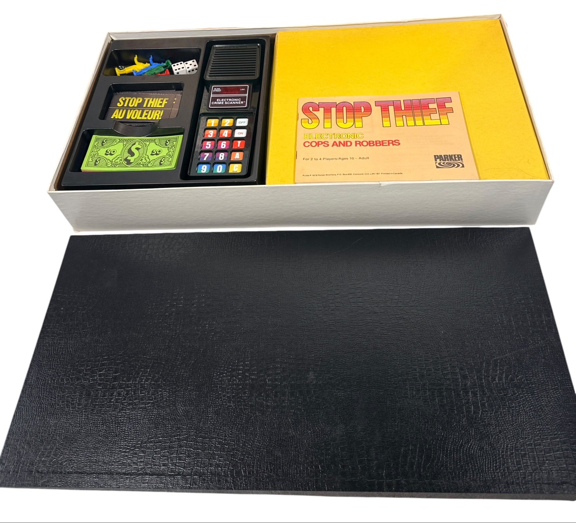 Vintage 1979 Stop Thief electronic board game by Parker Brothers, classic cops and robbers deduction game with retro crime scanner.