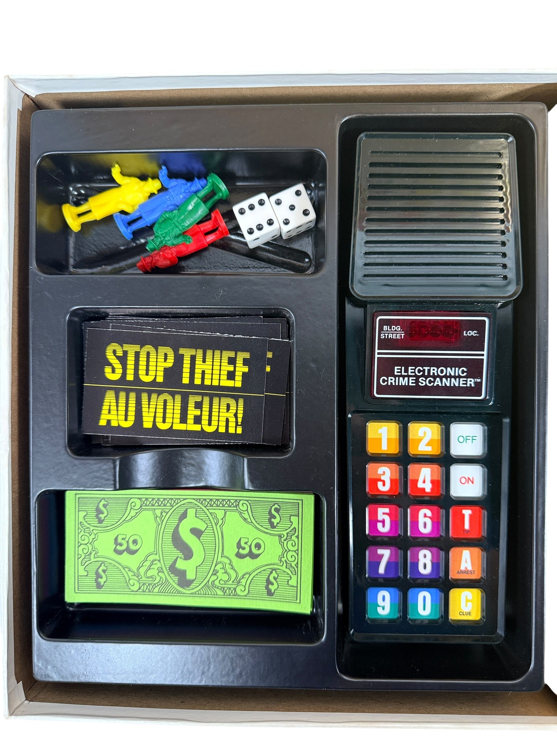 Vintage 1979 Stop Thief electronic board game by Parker Brothers, classic cops and robbers deduction game with retro crime scanner.
