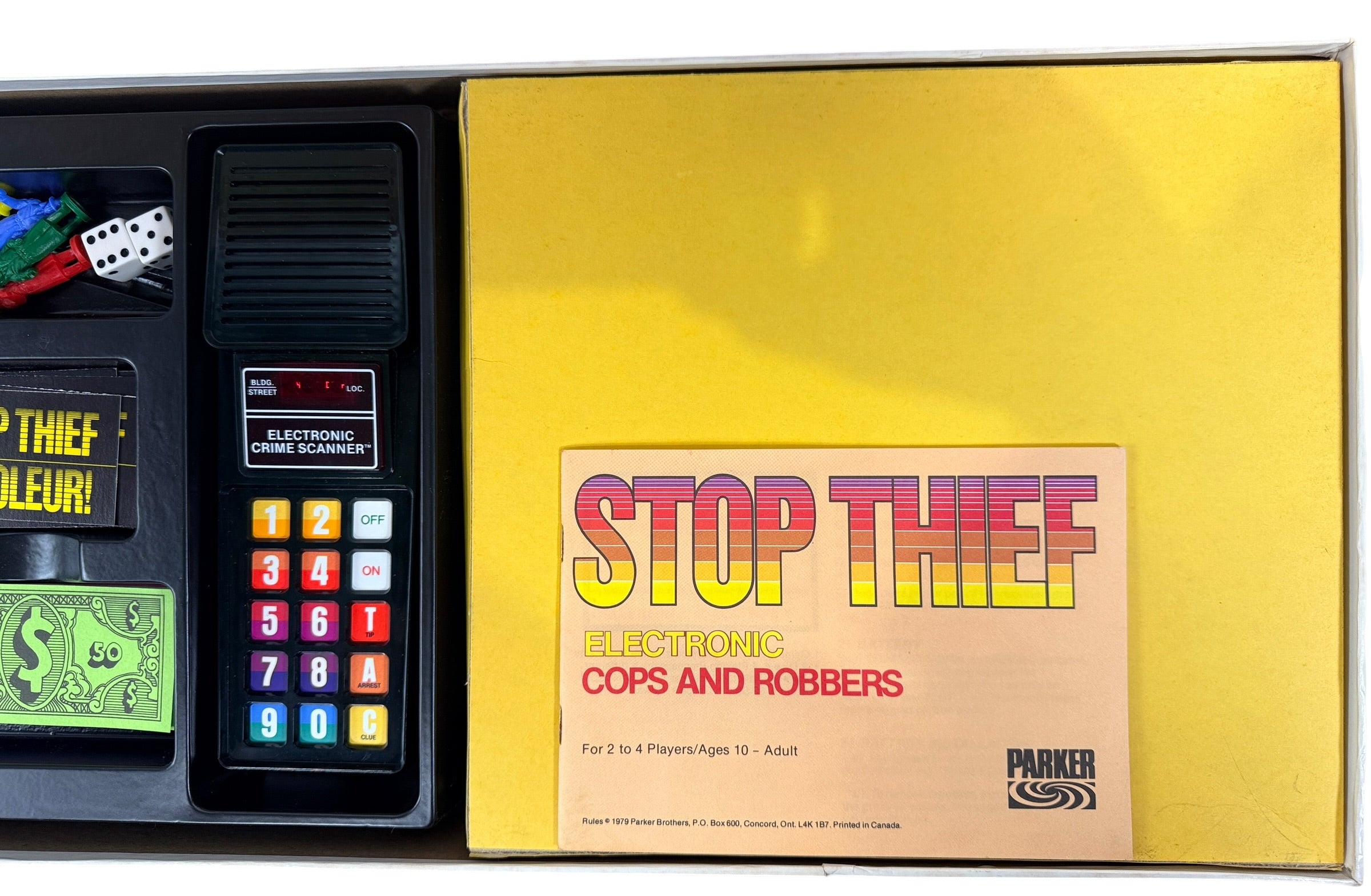 Vintage 1979 Stop Thief electronic board game by Parker Brothers, classic cops and robbers deduction game with retro crime scanner.