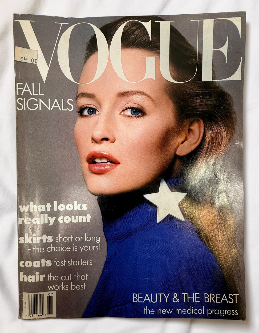 Vintage Vogue Magazine July 1986 fashion issue featuring Fall Signals, beauty trends, lifestyle articles and classic 1980s Vogue editorial content.