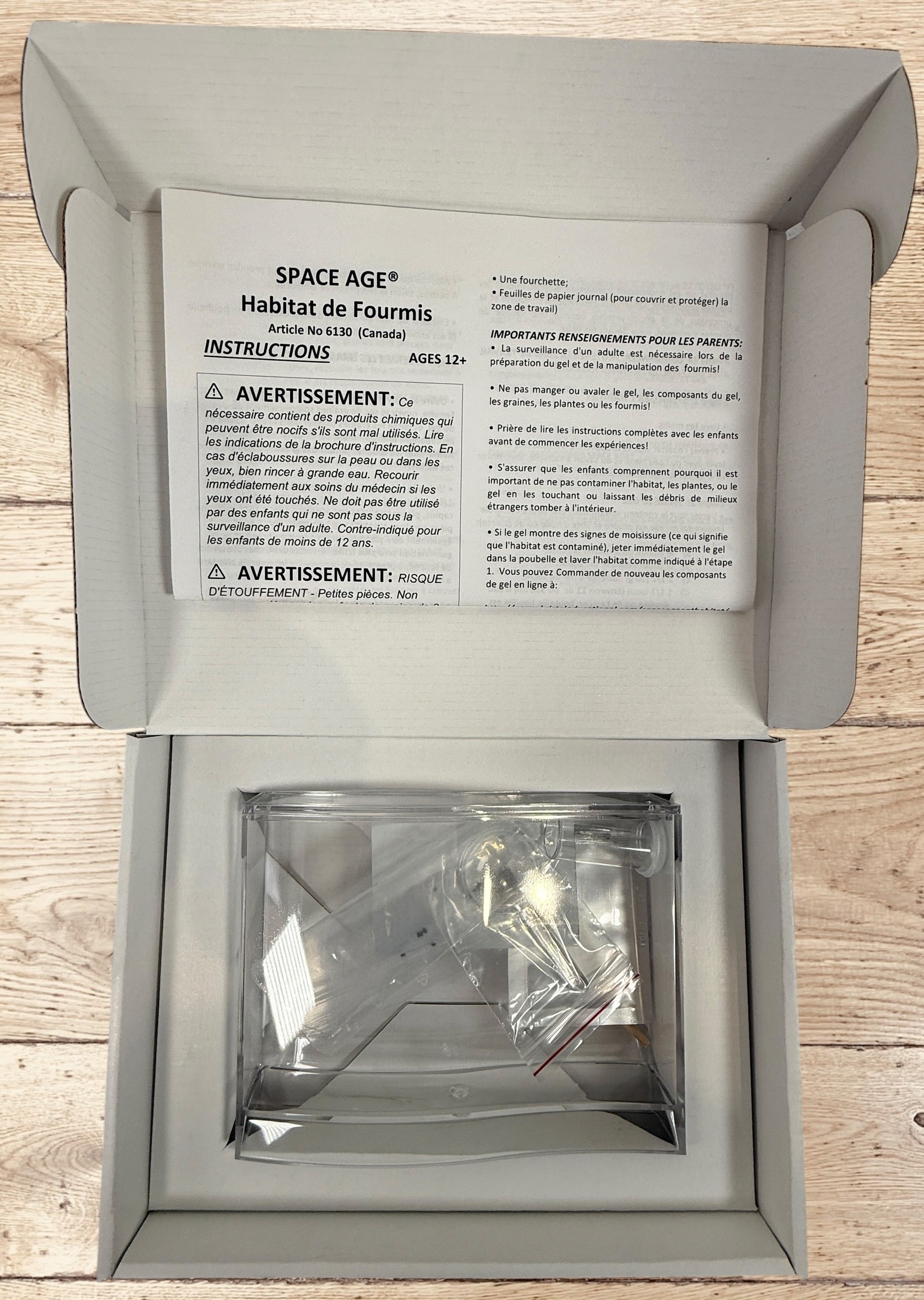 Complete Space Age Ant Habitat science kit by Kristall. Open box educational STEM ant farm set with original packaging, instructions, and accessories.