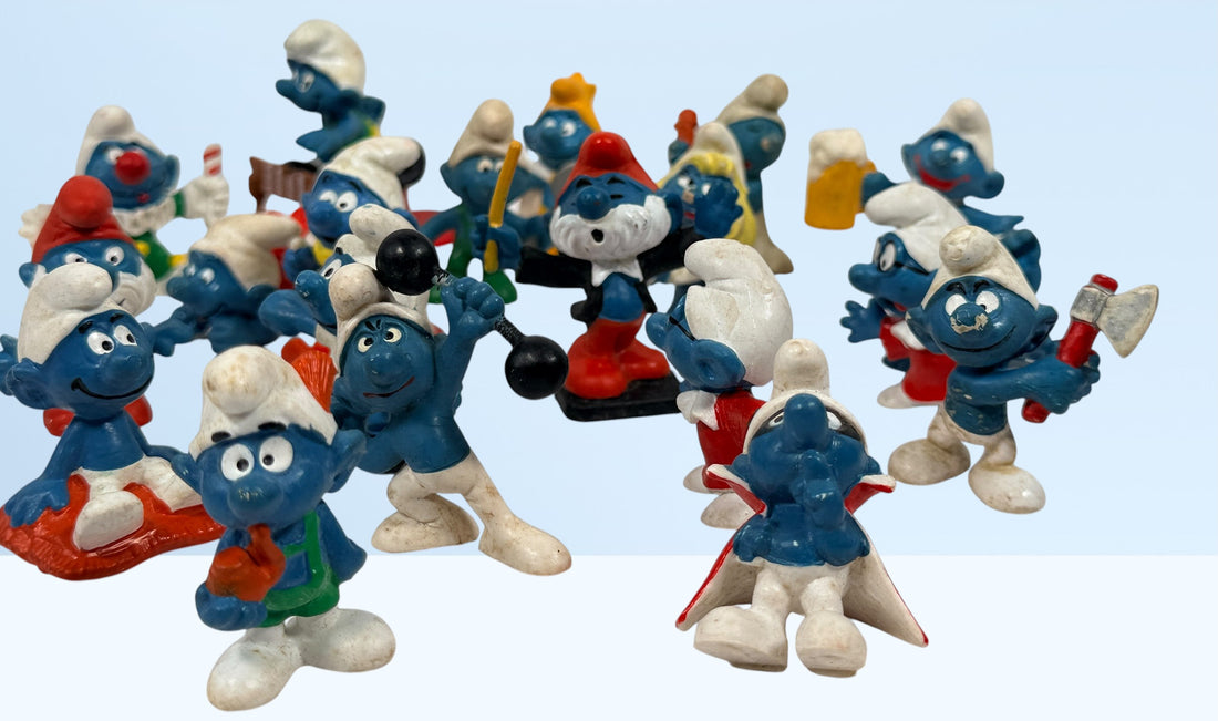 Vintage Peyo Smurf figure lot featuring 20 authentic West Germany Schleich PVC figures from the 1980s. Classic collectible characters in fair to good condition.