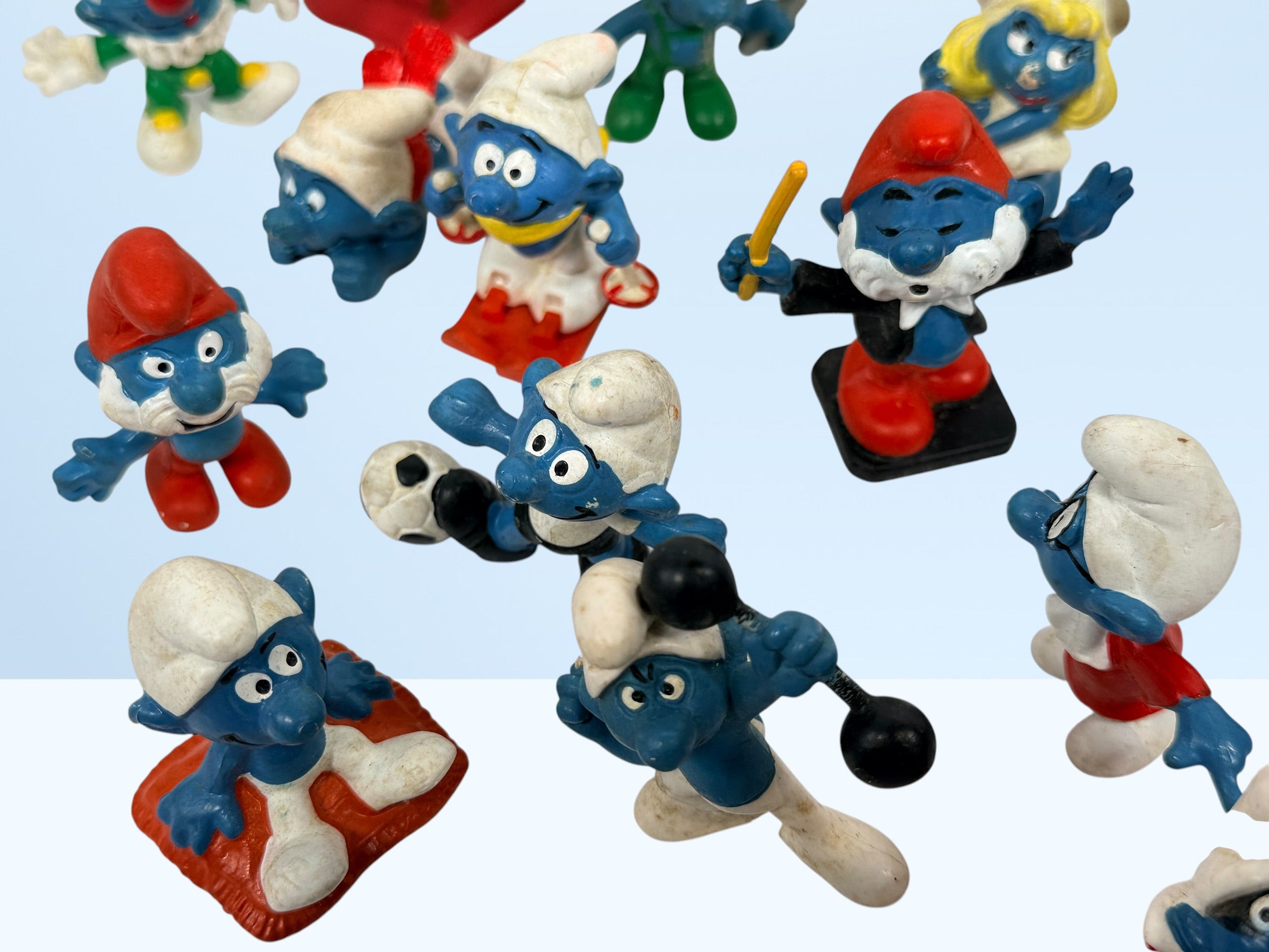 Lot de 20 figurines Schtroumpfs vintage en PVC de Peyo, Allemagne de l'Ouest, années 1980.