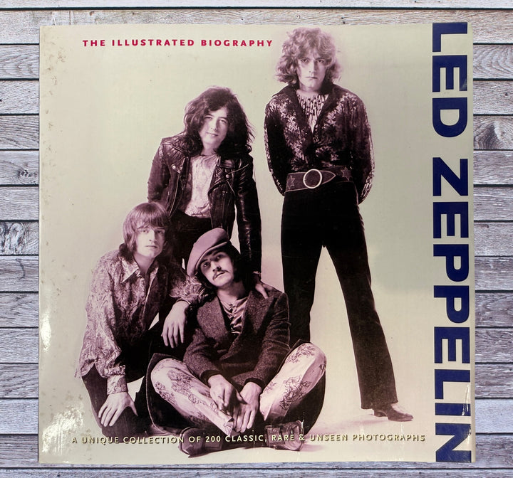 Led Zeppelin Illustrated Biography hardcover photo book featuring 200 rare and classic images. Great collectible for rock music fans and memorabilia collectors.