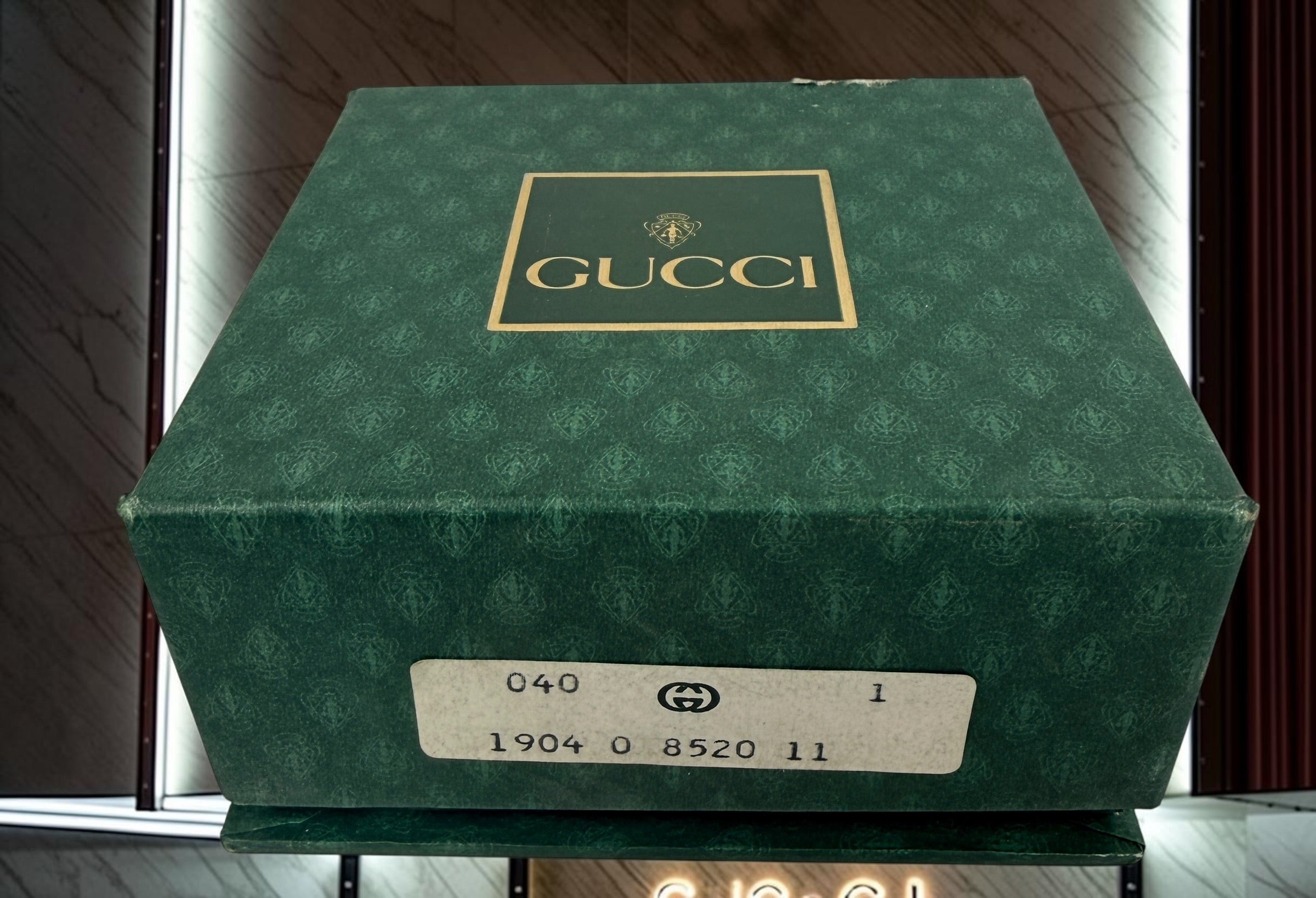 Vintage Gucci shoe care kit with original branded presentation box and Marrone Chiaro leather cream. Authentic luxury accessory from the 1980s–1990s.