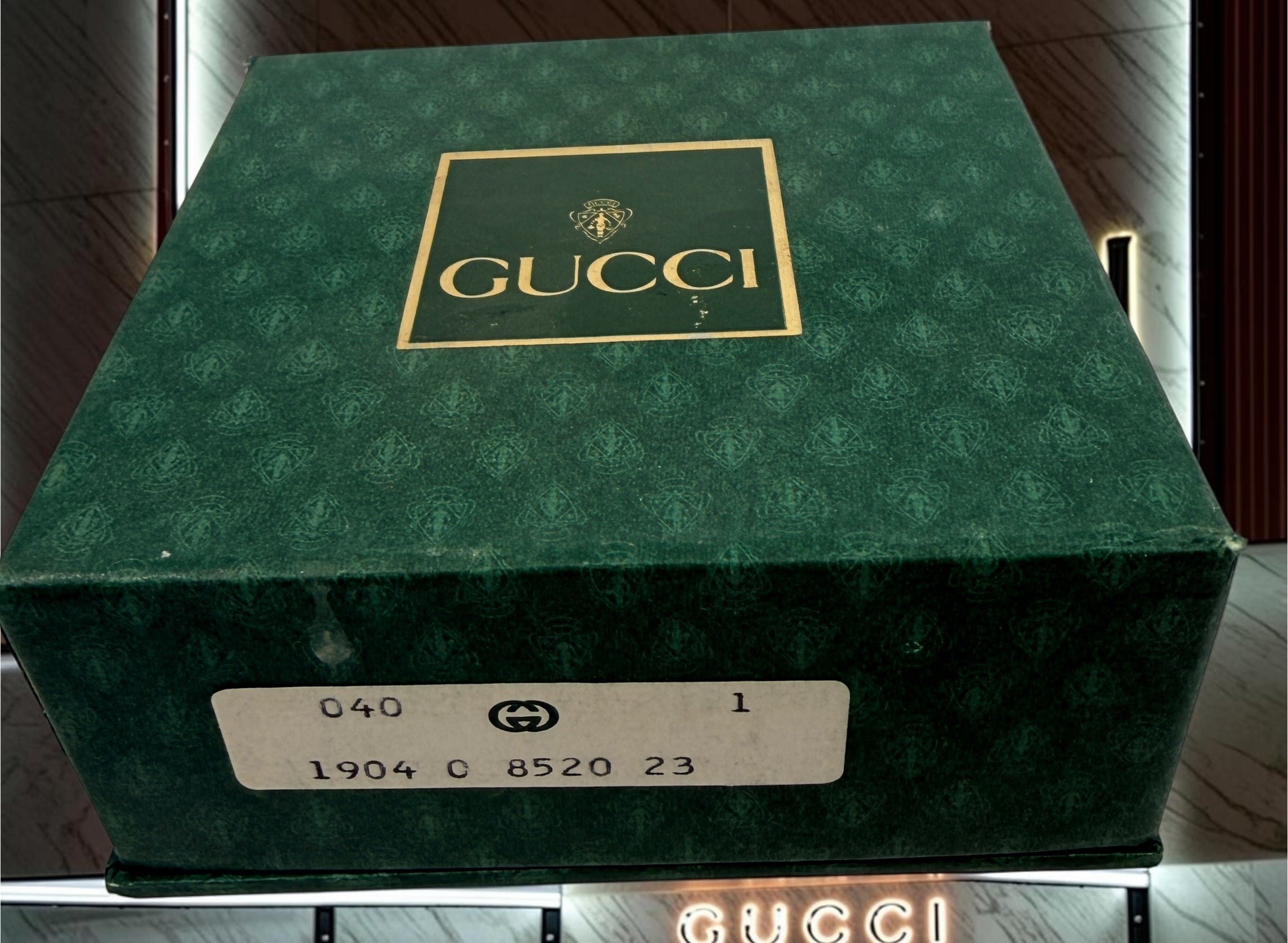 Vintage Gucci shoe care kit with original branded presentation box and Marrone Chiaro leather cream. Authentic luxury accessory from the 1980s–1990s.