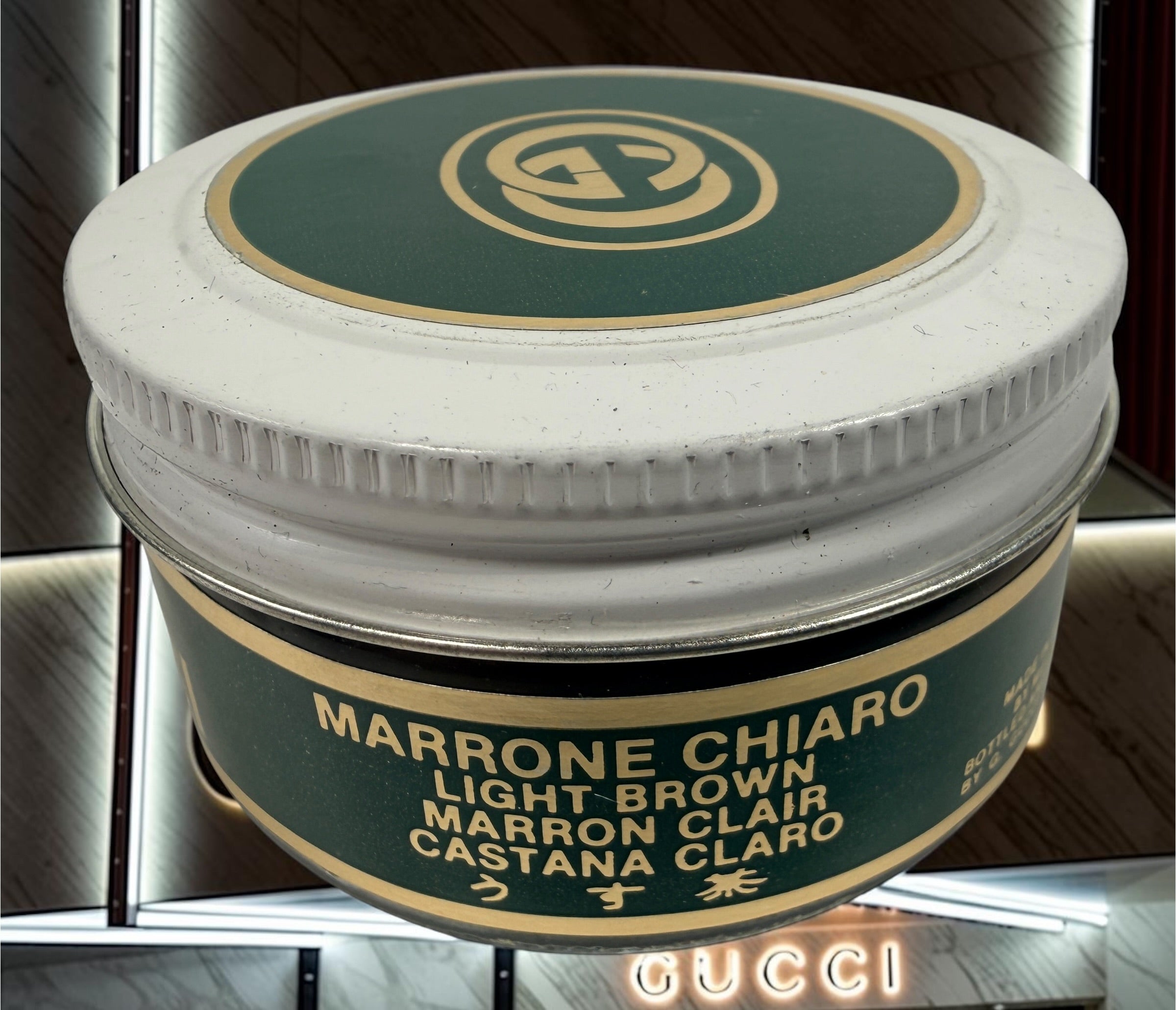 Vintage Gucci shoe care kit with original branded presentation box and Marrone Chiaro leather cream. Authentic luxury accessory from the 1980s–1990s.