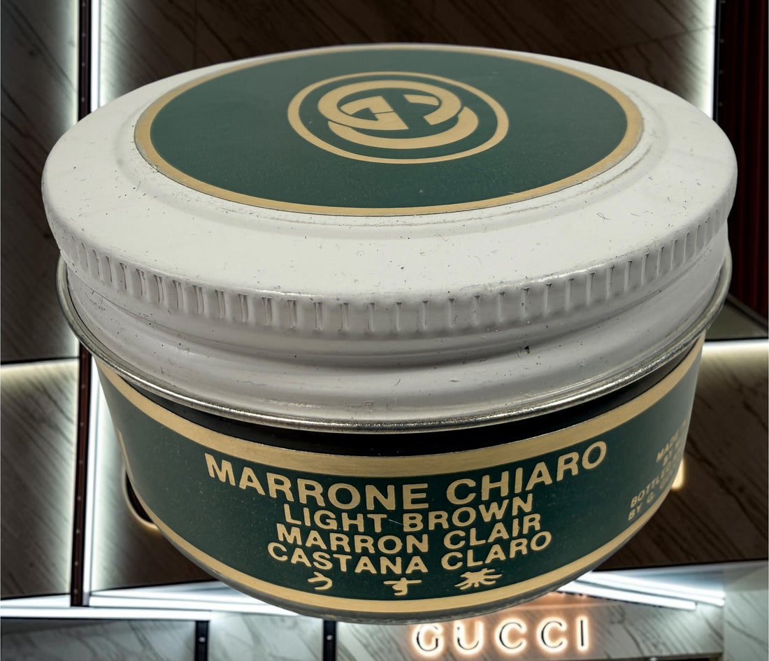 Vintage Gucci shoe care kit with original branded presentation box and Marrone Chiaro leather cream. Authentic luxury accessory from the 1980s–1990s.