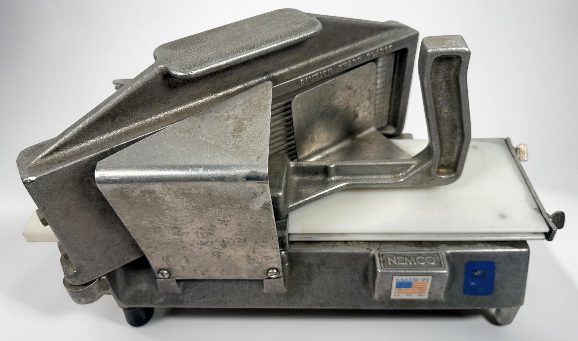 Nemco Easy Tomato Slicer II 55600-1 commercial restaurant slicer. Heavy-duty NSF-certified USA-made food prep equipment with blade assembly