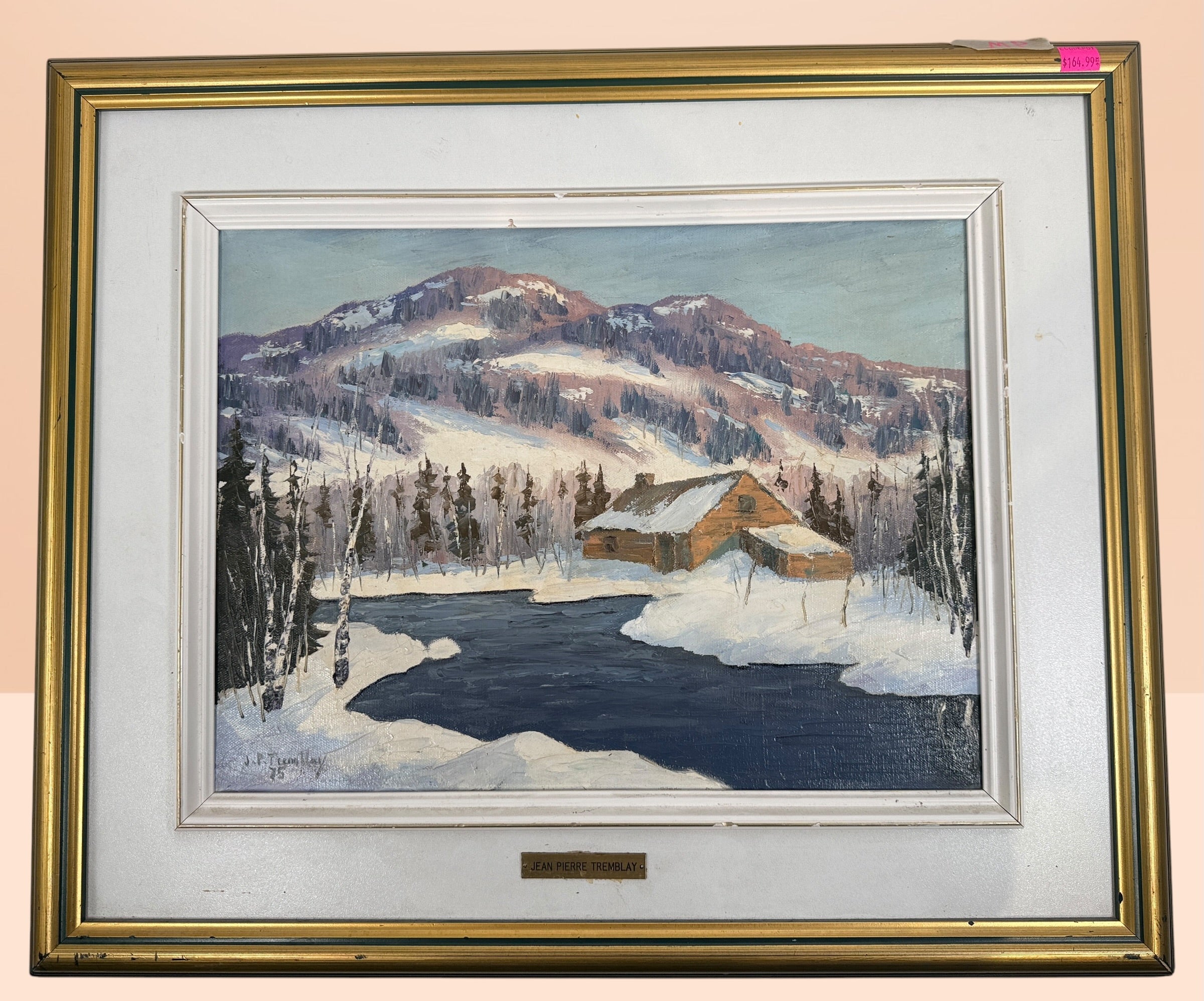 Original 1975 Jean Pierre Tremblay Quebec winter landscape oil painting featuring farmhouse, river, mountains and snow scene in original frame.