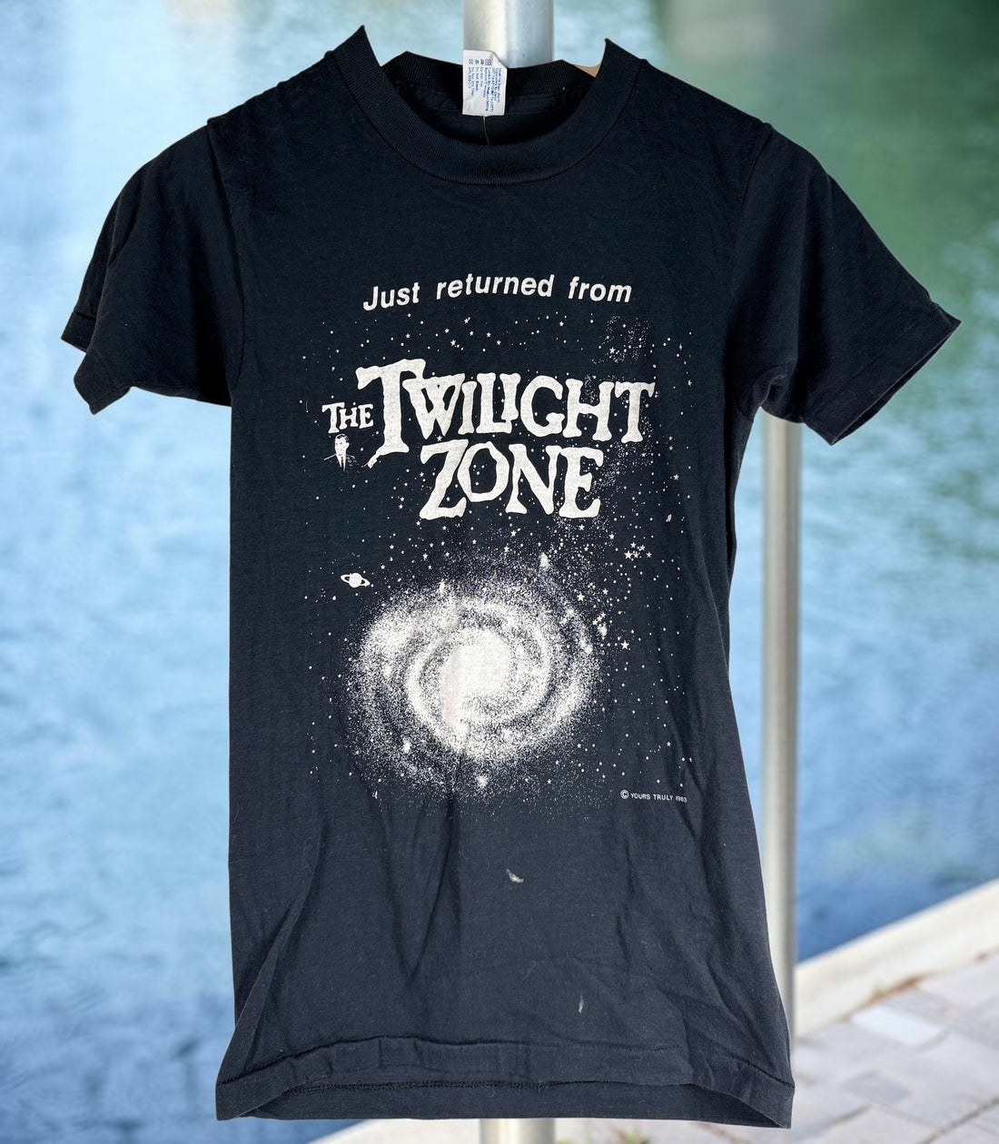 Authentic 1983 Twilight Zone vintage T-shirt on a Healthknit USA tag. Rare science fiction graphic tee featuring original artwork and classic 1980s styling.