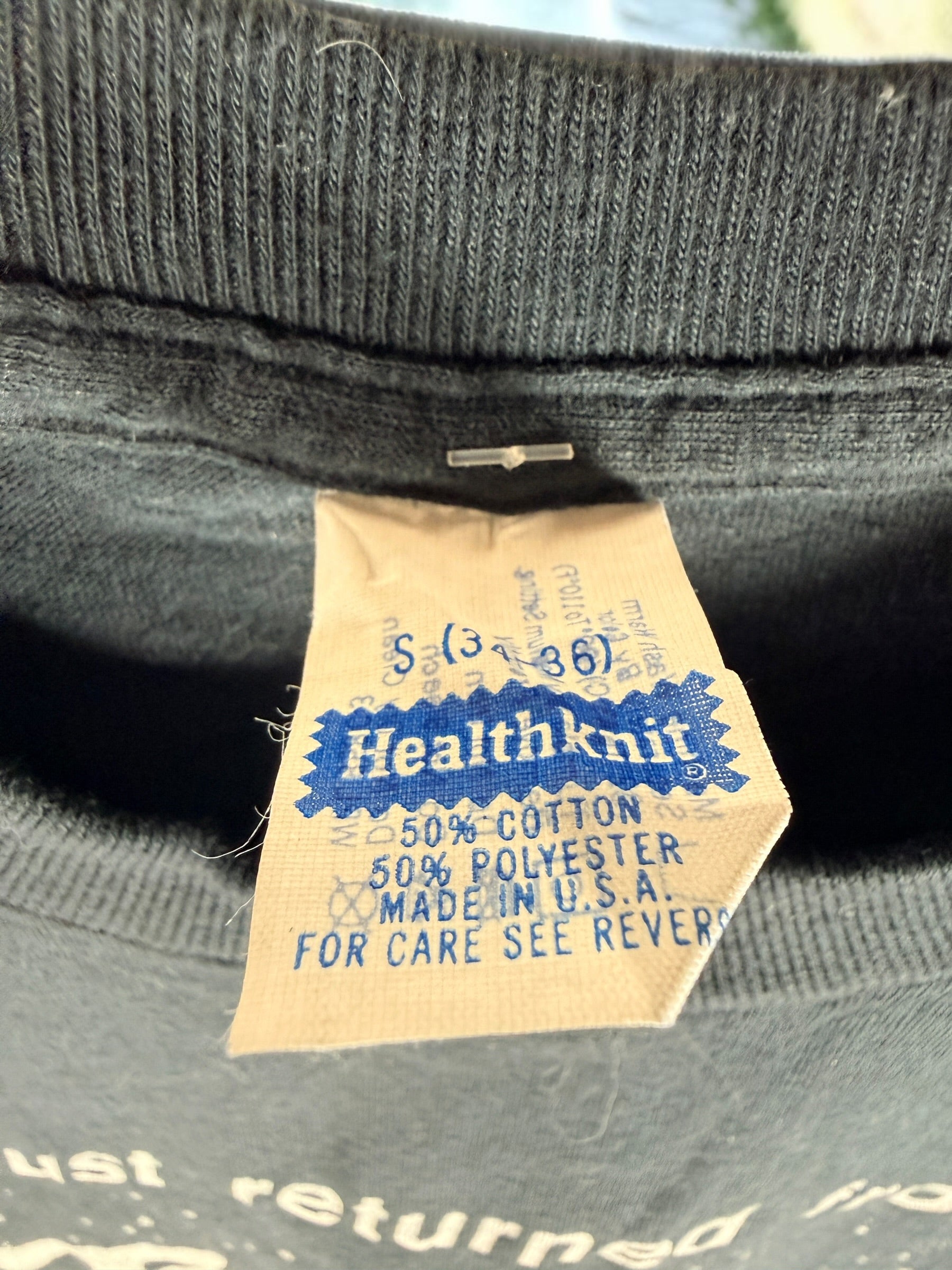 Authentic 1983 Twilight Zone vintage T-shirt on a Healthknit USA tag. Rare science fiction graphic tee featuring original artwork and classic 1980s styling.