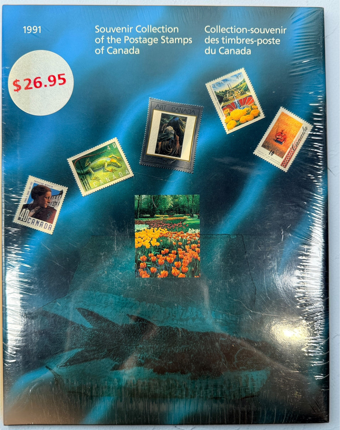Factory-sealed 1991 Canada Post Stamp Collection Yearbook featuring 61 mint Canadian stamps, bilingual content, and original Canada Post presentation.
