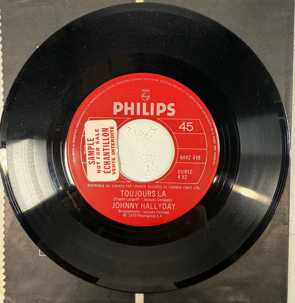 Vinyl record with a red label featuring the Philips logo and text.