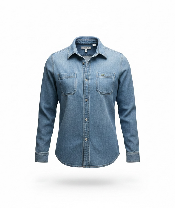 Authentic Lacoste kids denim overshirt in size 8 featuring snap-button closure, chest pockets, and classic crocodile logo. Light wash designer children’s wear.