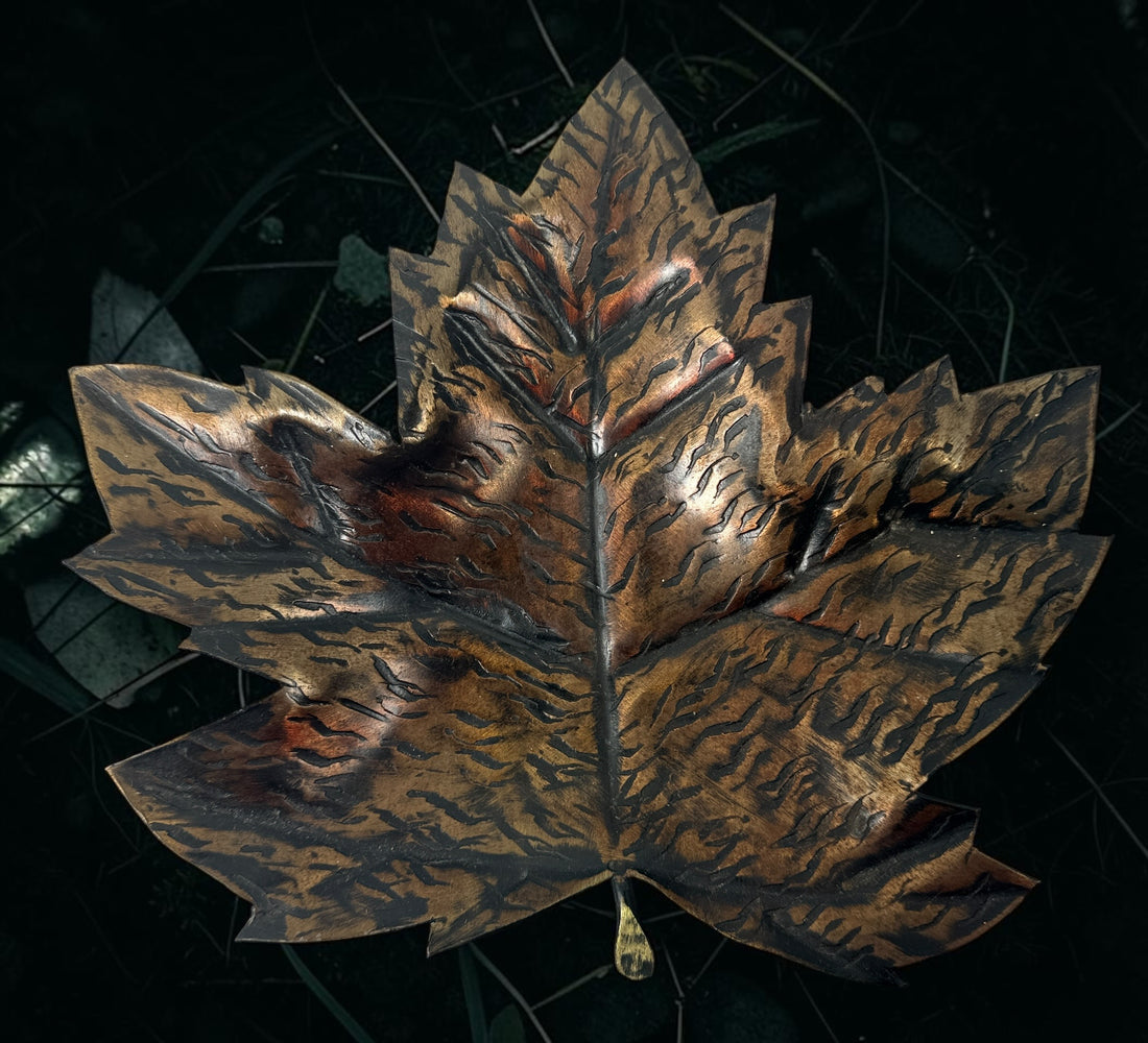 Authentic Au Fer Forge handcrafted maple leaf iron tray from Quebec. Vintage brutalist Canadian metalwork with original label and flame patina finish.