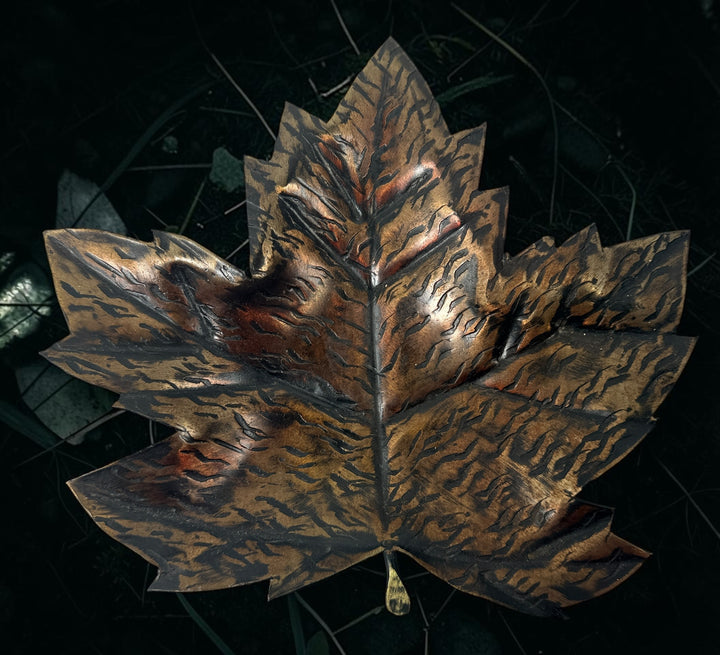 Authentic Au Fer Forge handcrafted maple leaf iron tray from Quebec. Vintage brutalist Canadian metalwork with original label and flame patina finish.
