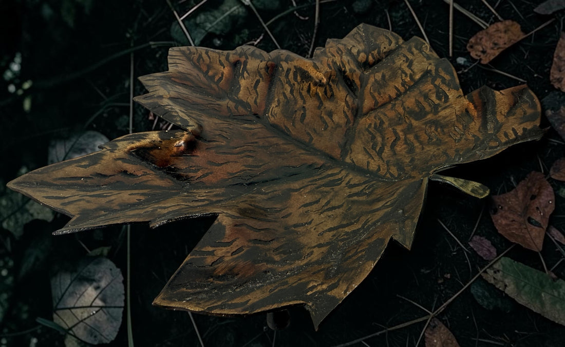 Authentic Au Fer Forge handcrafted maple leaf iron tray from Quebec. Vintage brutalist Canadian metalwork with original label and flame patina finish.